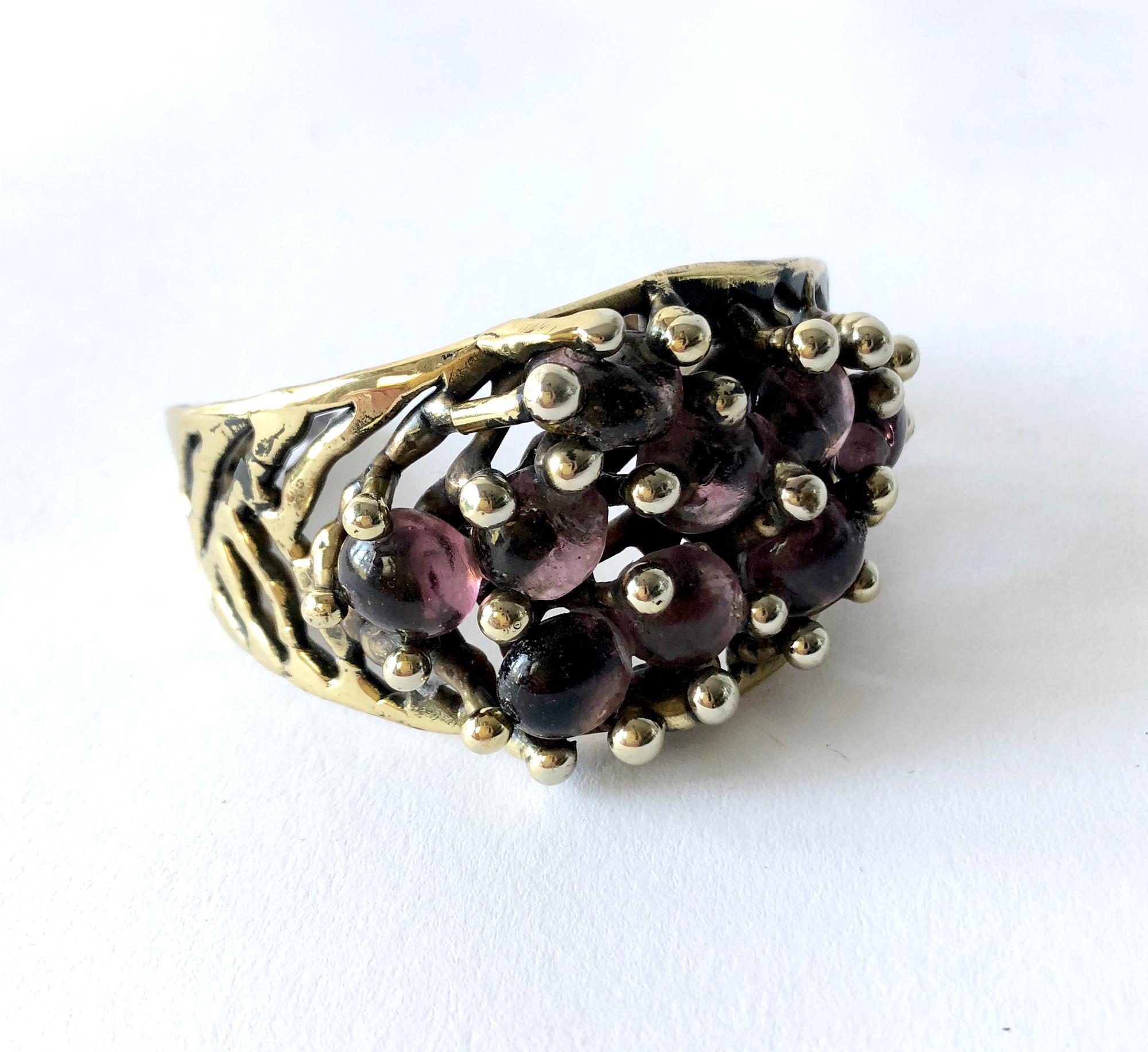 Handmade bronze and glass bracelet created by Michael Schwade of West Fork, Arkansas.  Bracelet circumference measure 6