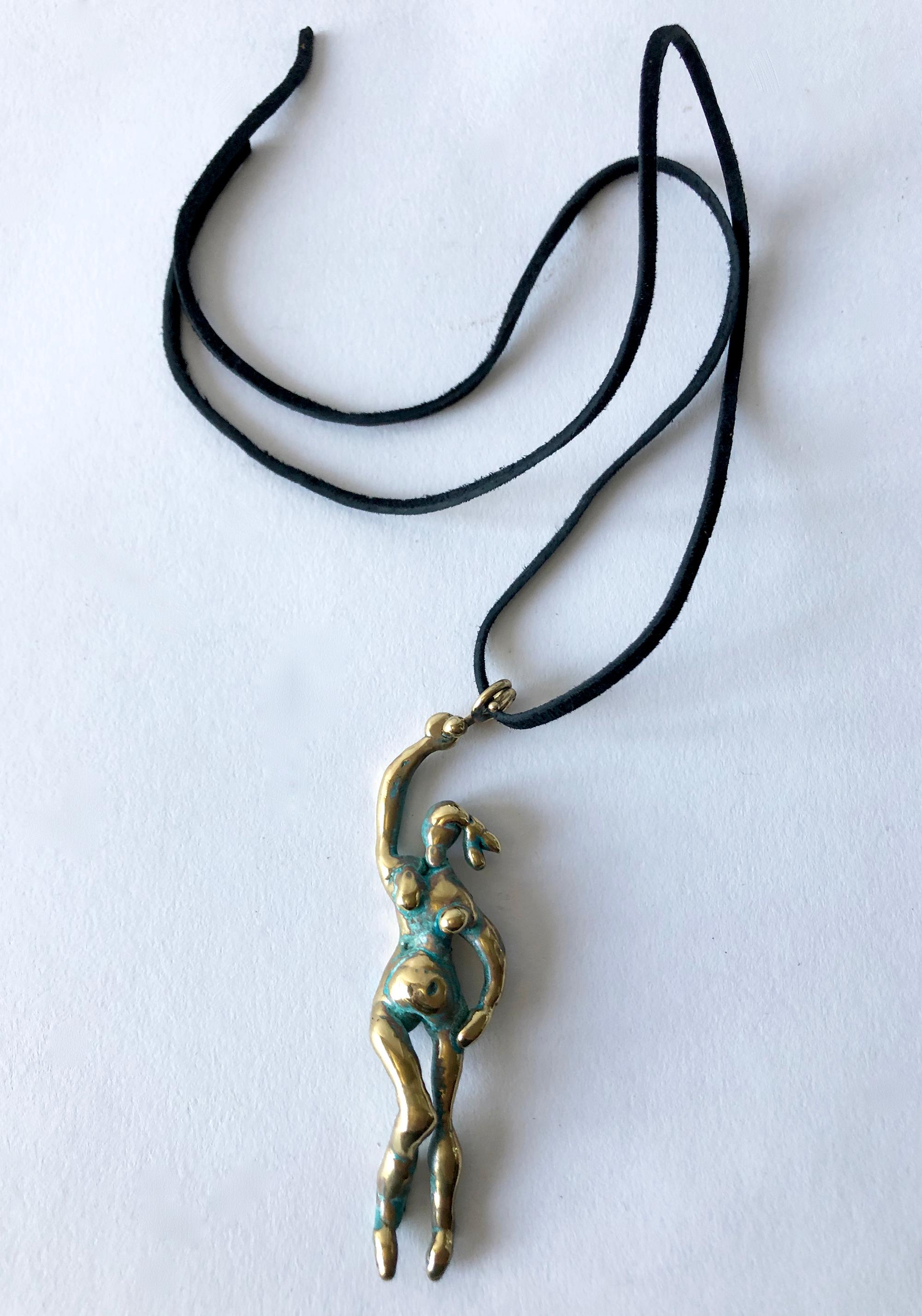 Handmade patinated bronze female deity pendant created by Michael Schwade of West Fork, Arkansas. Pendant measures 3.5