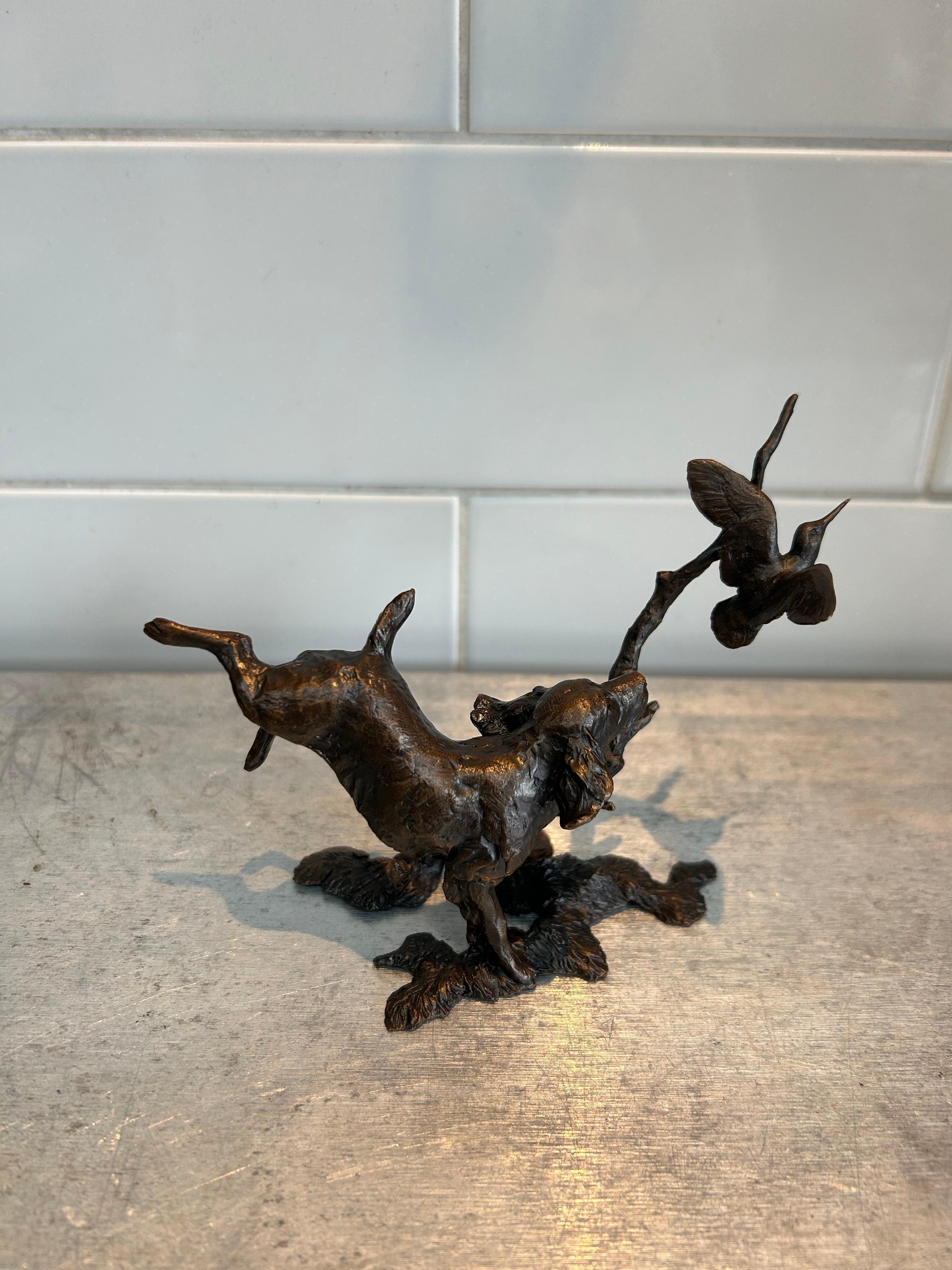 With its engraved signature this first edition of a small limited edition of 200 depicting a springer spaniel chasing after a woodcock in-flight. The exquisite attention to detail in this piece captures, the essence of the beloved dog breed. This