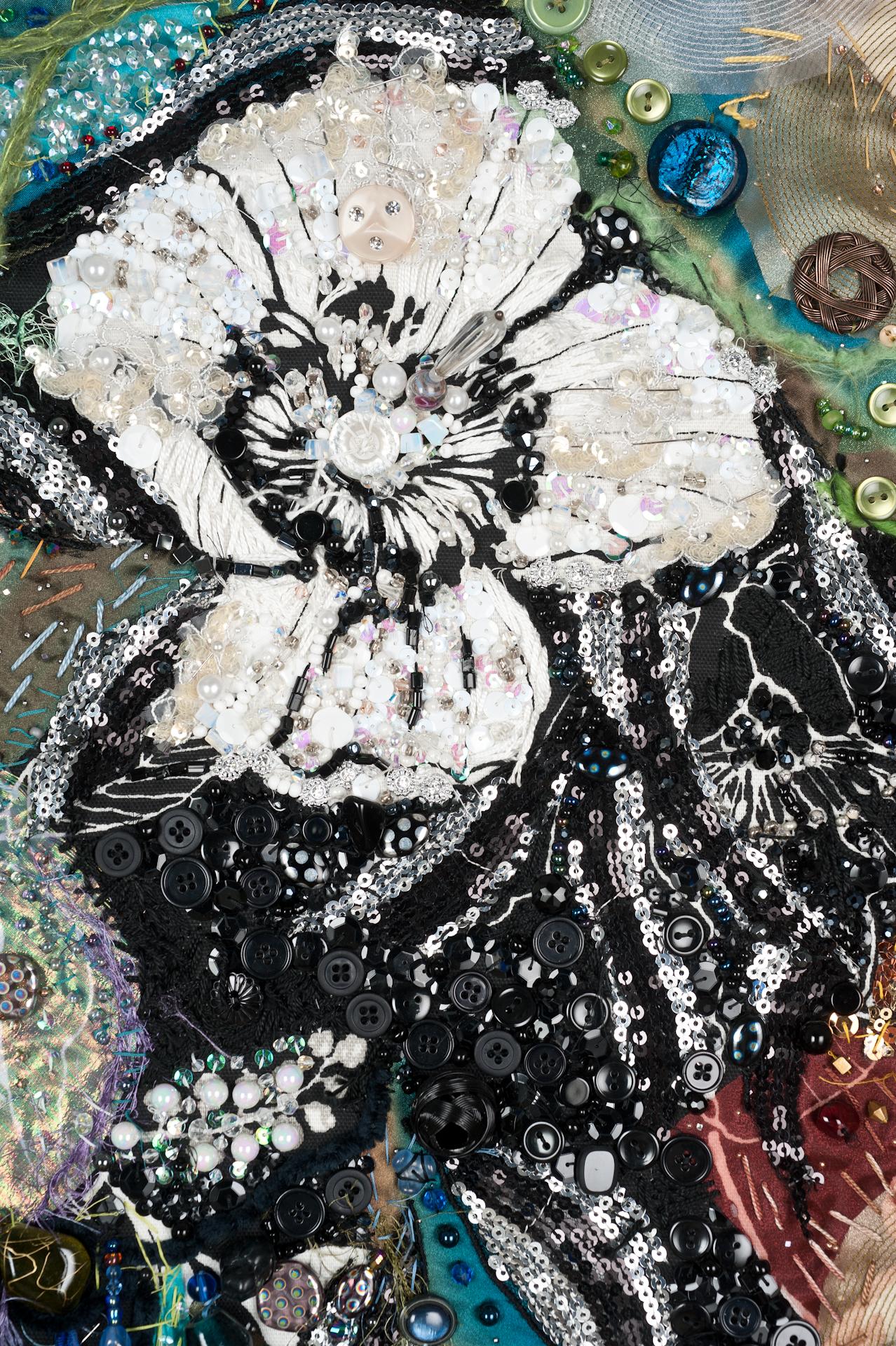 “My contemporary fiber art intersects fashion, sculpture, street art and queer activism through innovative use of textile collage and text-based art techniques. I begin with textiles selected for elaborate patterns, then reassembled into textile