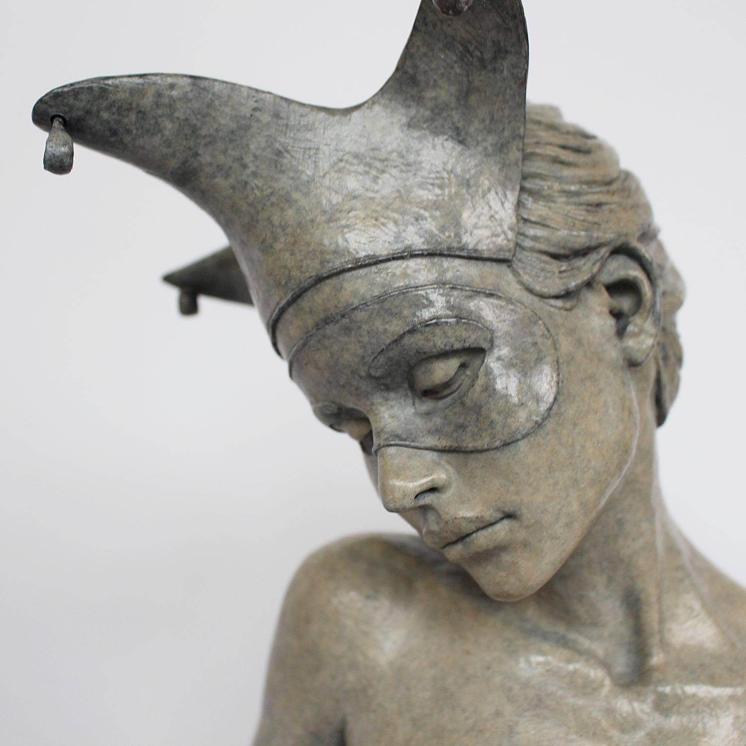 Harlequin, a limited edition, a patinated bronze figure of a dancer with harlequin hat. Set onto a granite plinth.

Signed and numbered edition of 15

After completing a Masters degree at the Royal Academy in London 1980, Michael Talbot was led