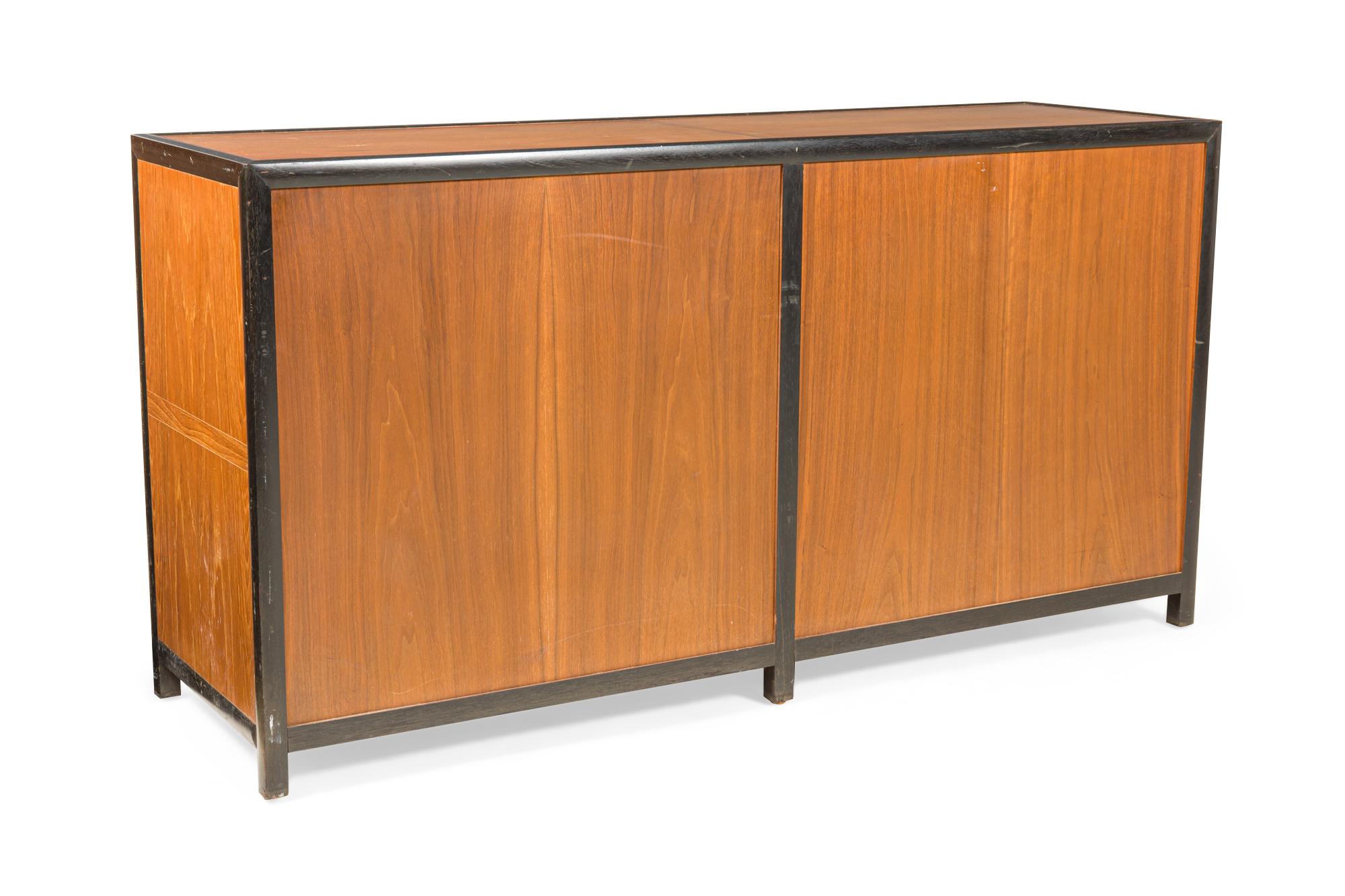American Michael Taylor 8-Drawer Walnut and Interlocking Brass Ring Pull Low Chest For Sale