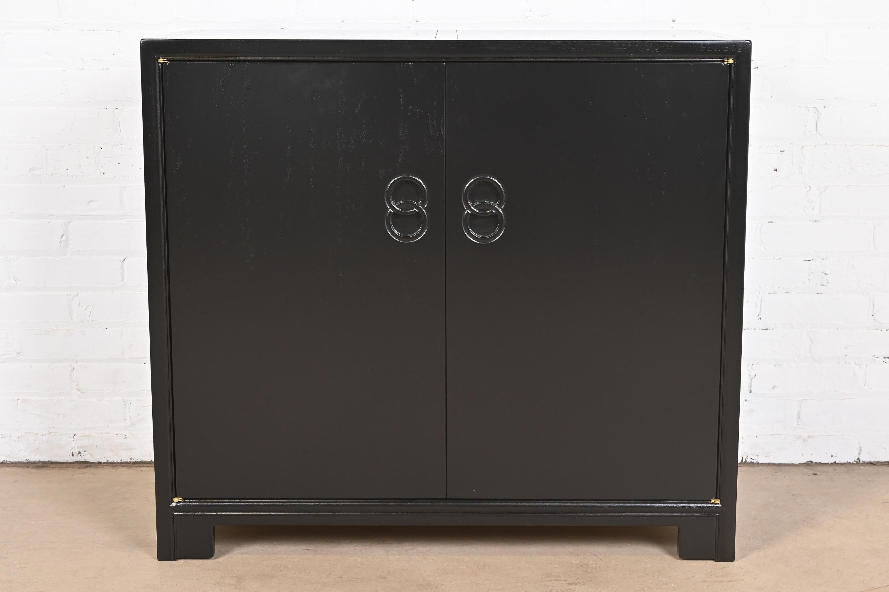 A stunning mid-century modern Hollywood Regency Chinoiserie six-drawer dresser, chest of drawers, or buffet server

By Michael Taylor for Baker Furniture, 