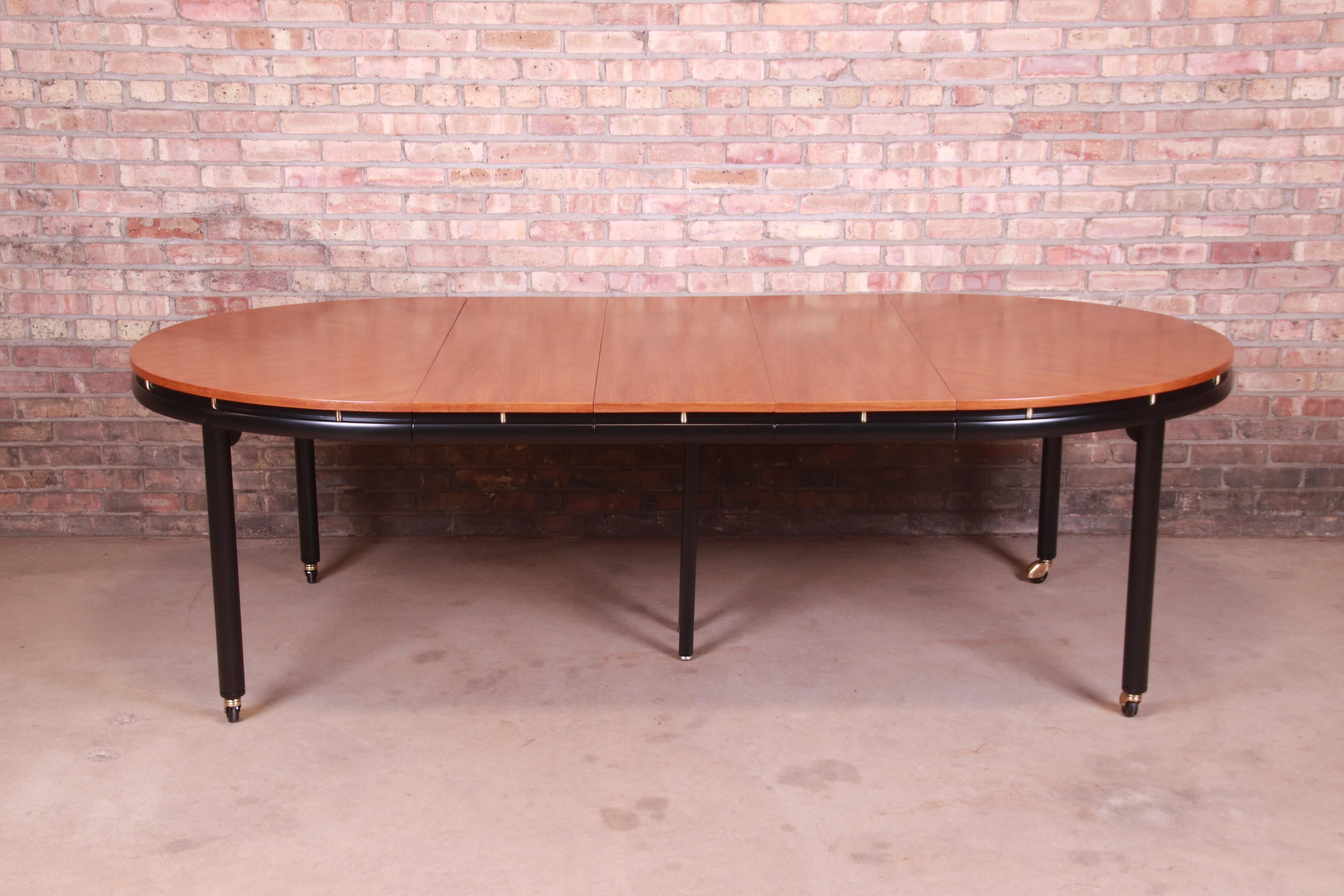 An exceptional Mid-Century Modern Hollywood Regency chinoiserie extension dining table

By Michael Taylor for Baker Furniture 