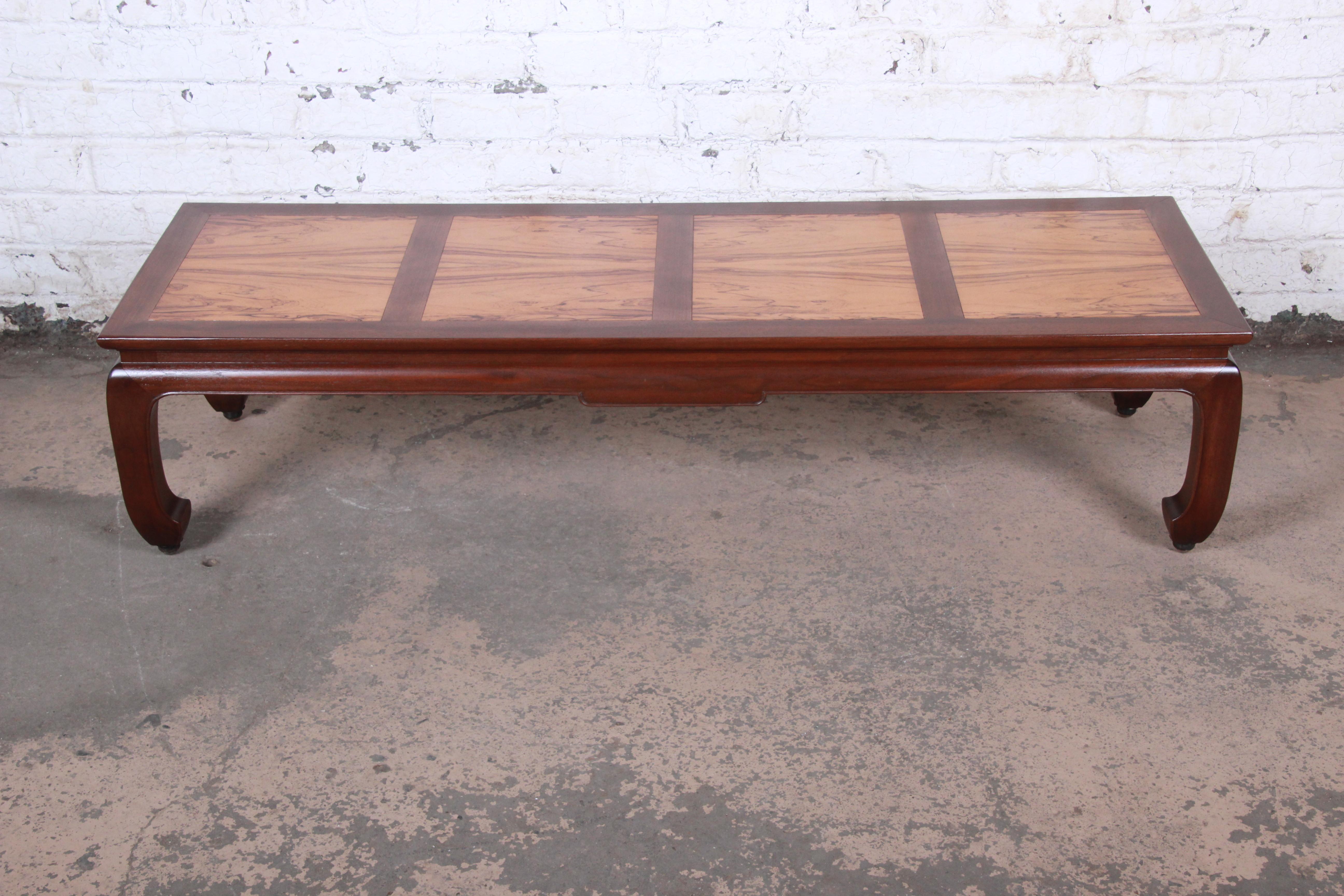 A gorgeous Mid-Century Modern Hollywood Regency chinoiserie coffee or cocktail table

Designed by Michael Taylor for the Far East Collection for Baker Furniture

USA, 1960s

Book-matched bleached rosewood and walnut and spring-loaded ball
