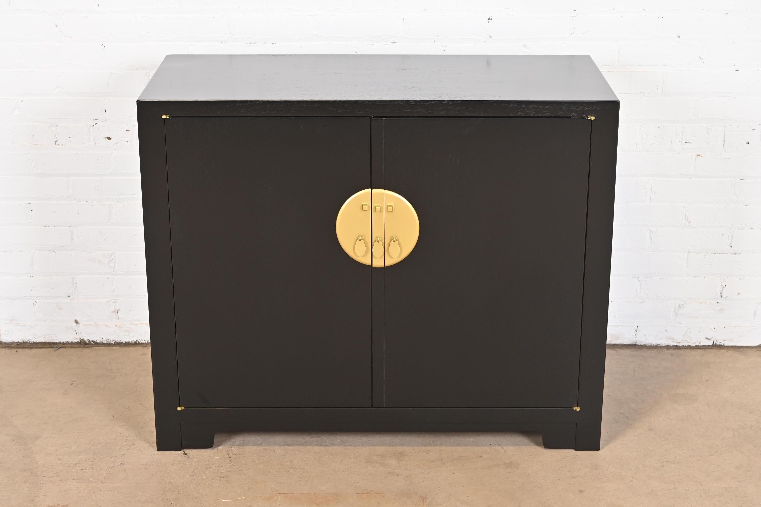 An exceptional mid-century modern Hollywood Regency Chinoiserie compact credenza, sideboard buffet, or bar cabinet.

By Michael Taylor for Baker Furniture 