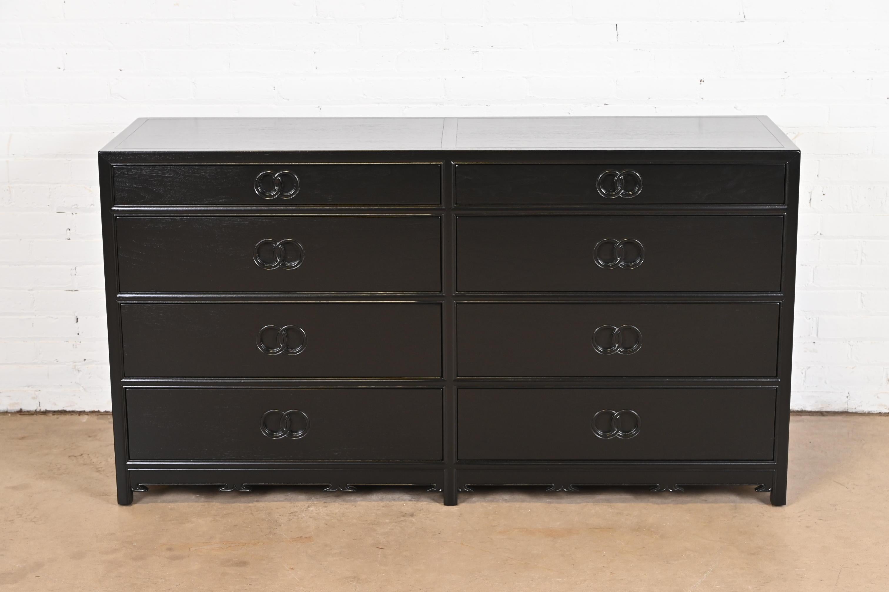 A stunning mid-century modern Hollywood Regency Chinoiserie eight-drawer double dresser or credenza

By Michael Taylor for Baker Furniture, 