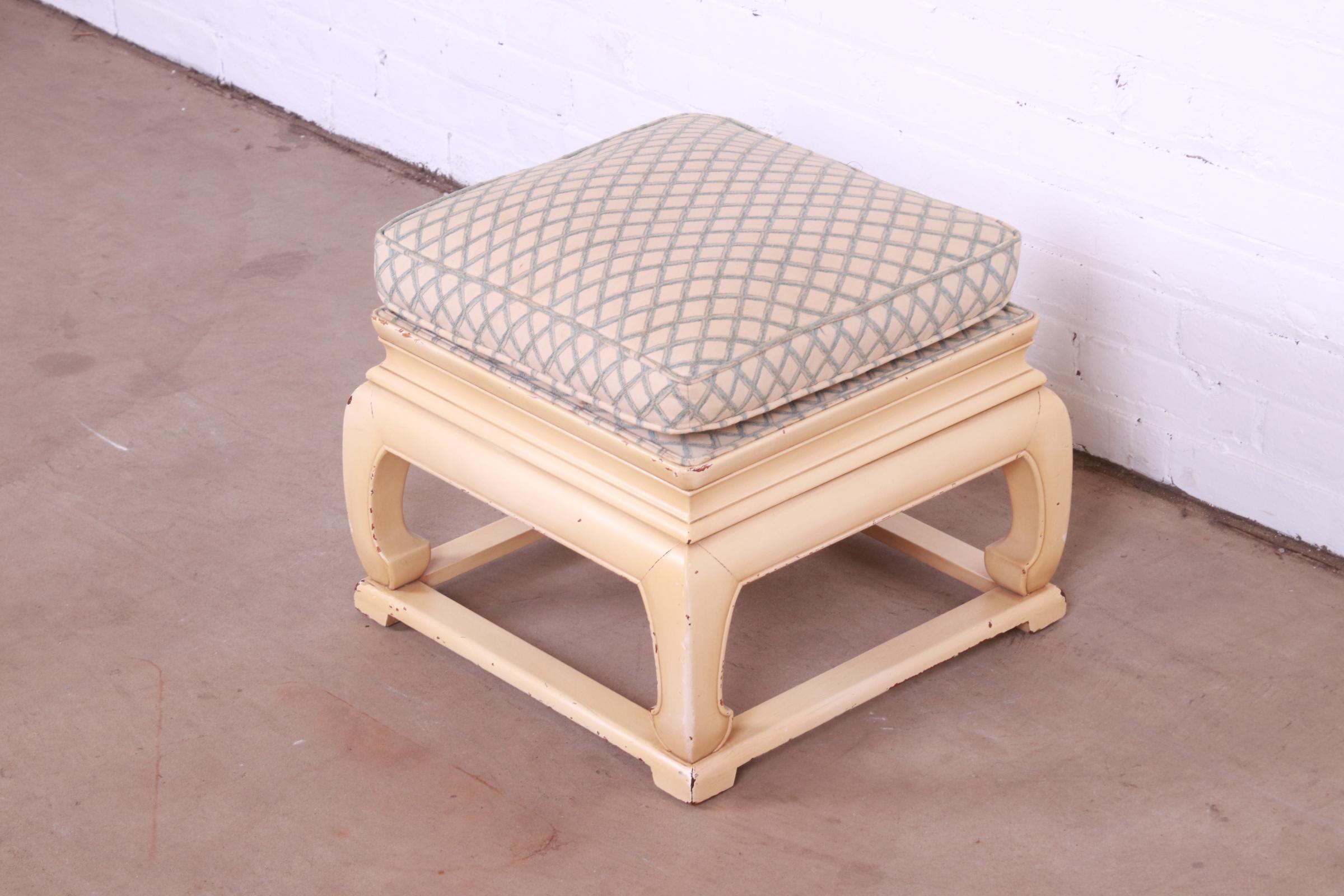 A gorgeous Mid-Century Modern Hollywood Regency Chinoiserie footstool or ottoman

By Michael Taylor for Baker Furniture

USA, Circa 1960s

Cream lacquered walnut, with light blue and cream upholstery.

Measures: 18