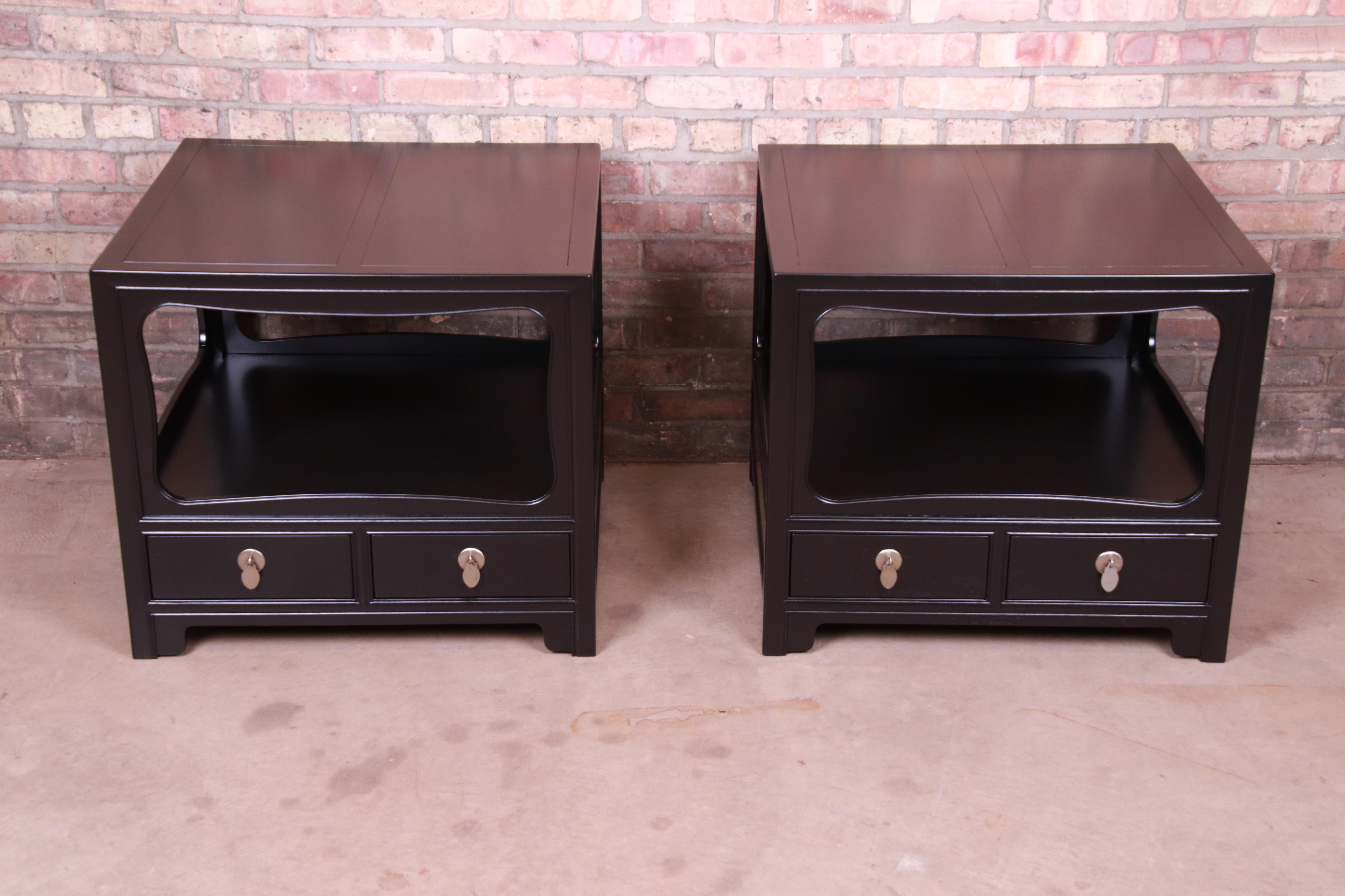 An exceptional pair of mid-century modern Hollywood Regency chinoiserie ebonized nightstands or side tables

By Michael Taylor for Baker Furniture 