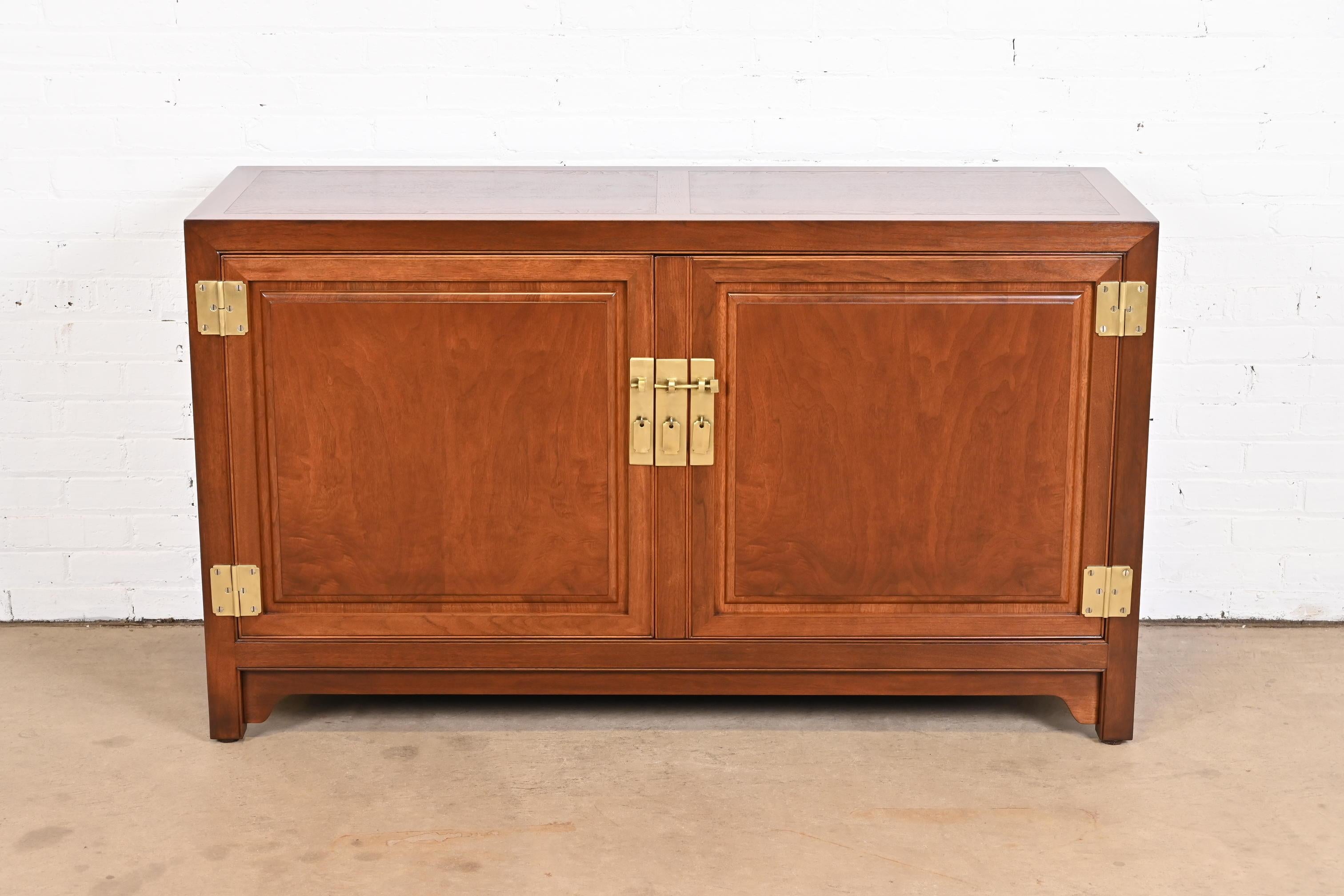 A stunning Mid-Century Modern Hollywood Regency Chinoiserie sideboard, credenza, or bar cabinet

By Michael Taylor for Baker Furniture, 