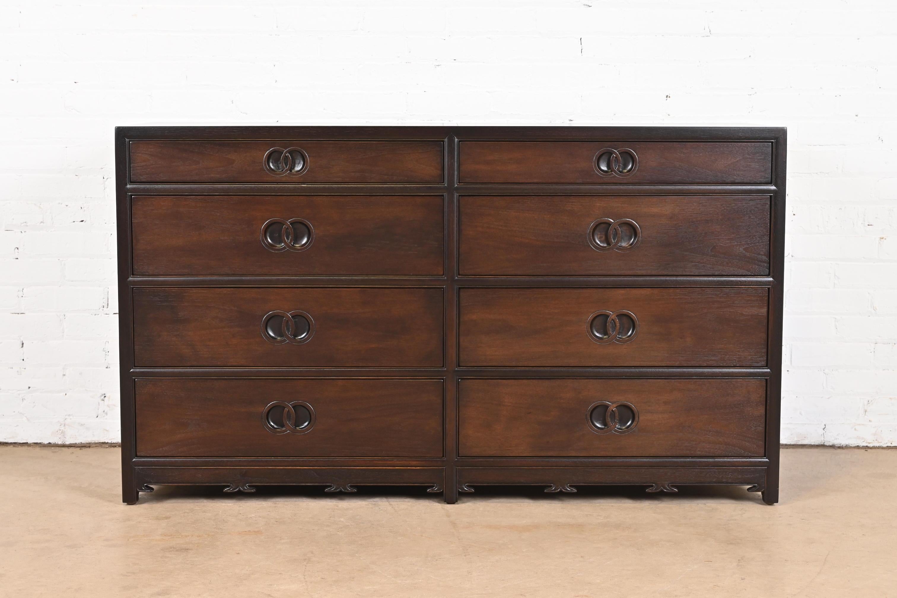 A stunning mid-century modern Hollywood Regency Chinoiserie eight-drawer double dresser or credenza

By Michael Taylor for Baker Furniture, 