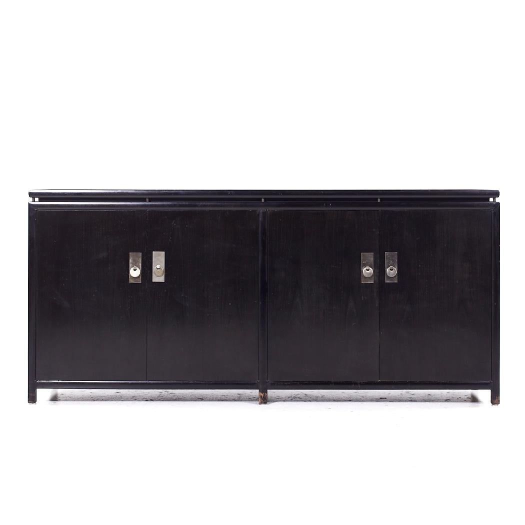 Michael Taylor for Baker Far East Mid Century Ebonized Credenza

This credenza measures: 74.5 wide x 19 deep x 34 inches high

All pieces of furniture can be had in what we call restored vintage condition. That means the piece is restored upon