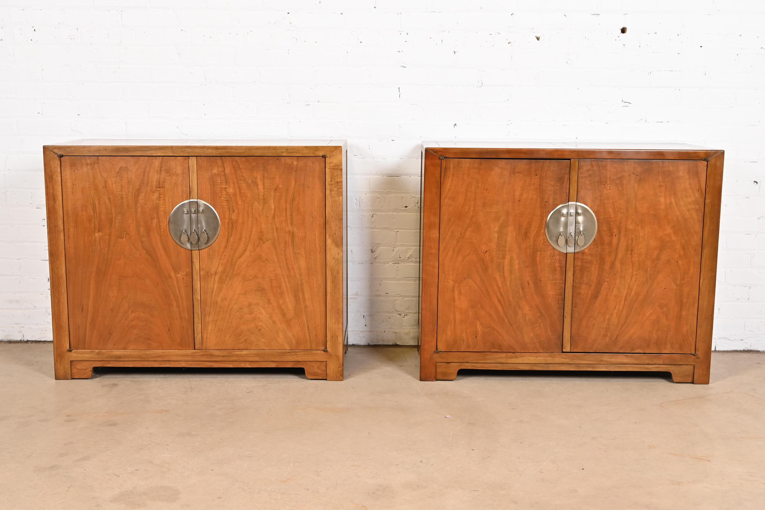 An exceptional pair of mid-century modern Hollywood Regency Chinoiserie compact credenzas, sideboard buffets, or bar cabinets

By Michael Taylor for Baker Furniture, 