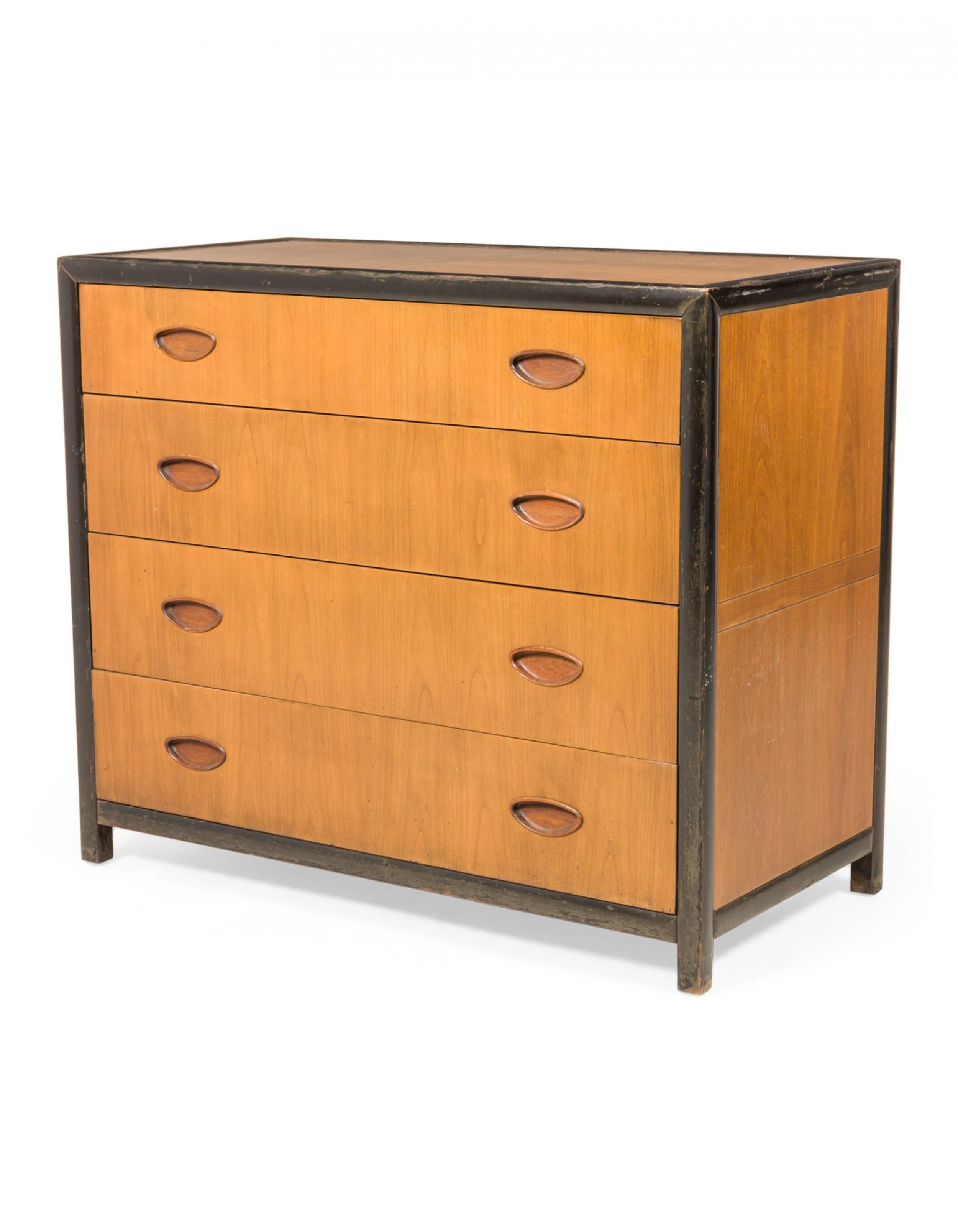 American Mid-Century four drawer commode with a dark stained frame and walnut drawer fronts and body with cut out half-moon drawer pulls. (MICHAEL TAYLOR FOR BAKER FURNITURE CO, NEW WORLD GROUP).
