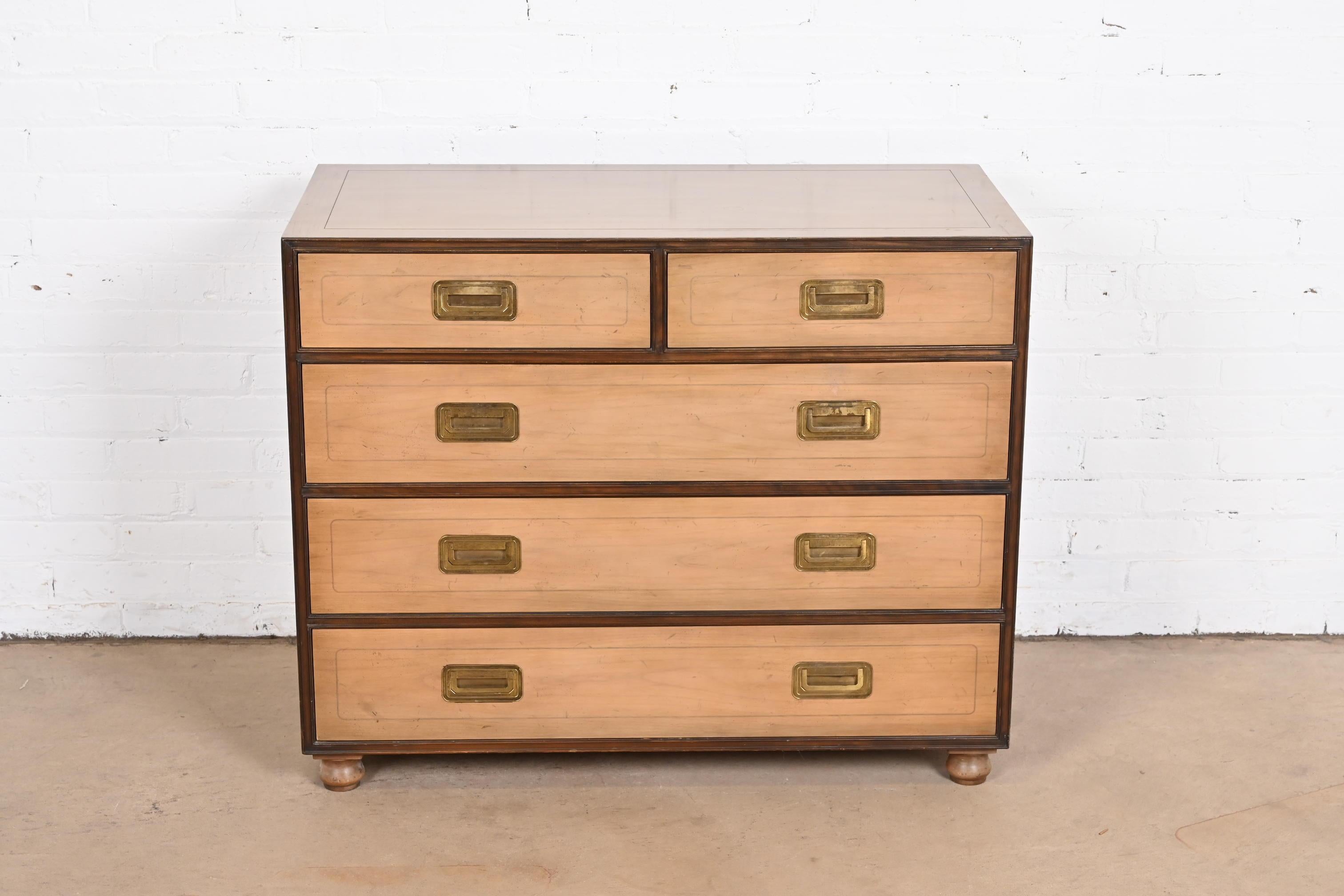 A gorgeous Mid-Century Modern Hollywood Regency Campaign style five-drawer dresser or chest of drawers.

By Michael Taylor Baker Furniture

USA, 1960s

Bleached walnut, with original brass hardware.

Measures: 38