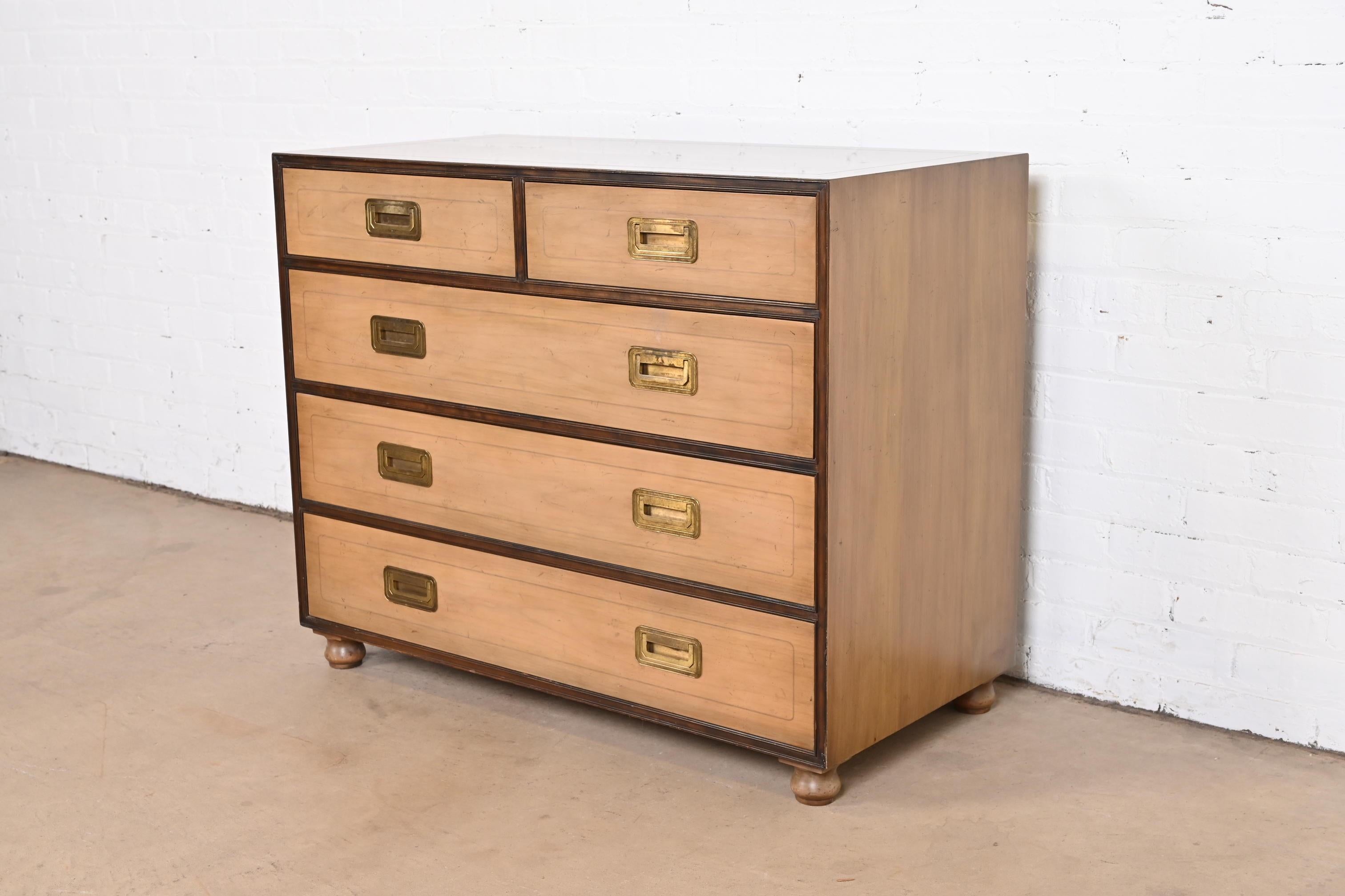 A gorgeous Mid-Century Modern Hollywood Regency Campaign style five-drawer dresser or chest of drawers.

By Michael Taylor Baker Furniture

USA, 1960s

Bleached walnut, with original brass hardware.

Measures: 38