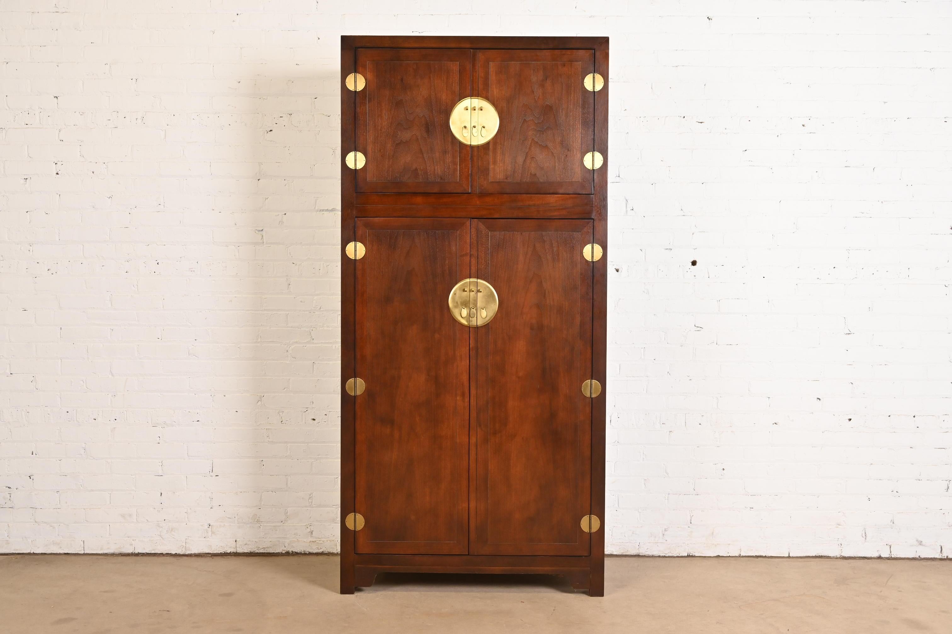 A stunning mid-century modern Hollywood Regency Chinoiserie lighted bar cabinet or armoire dresser

By Michael Taylor for Baker Furniture, 