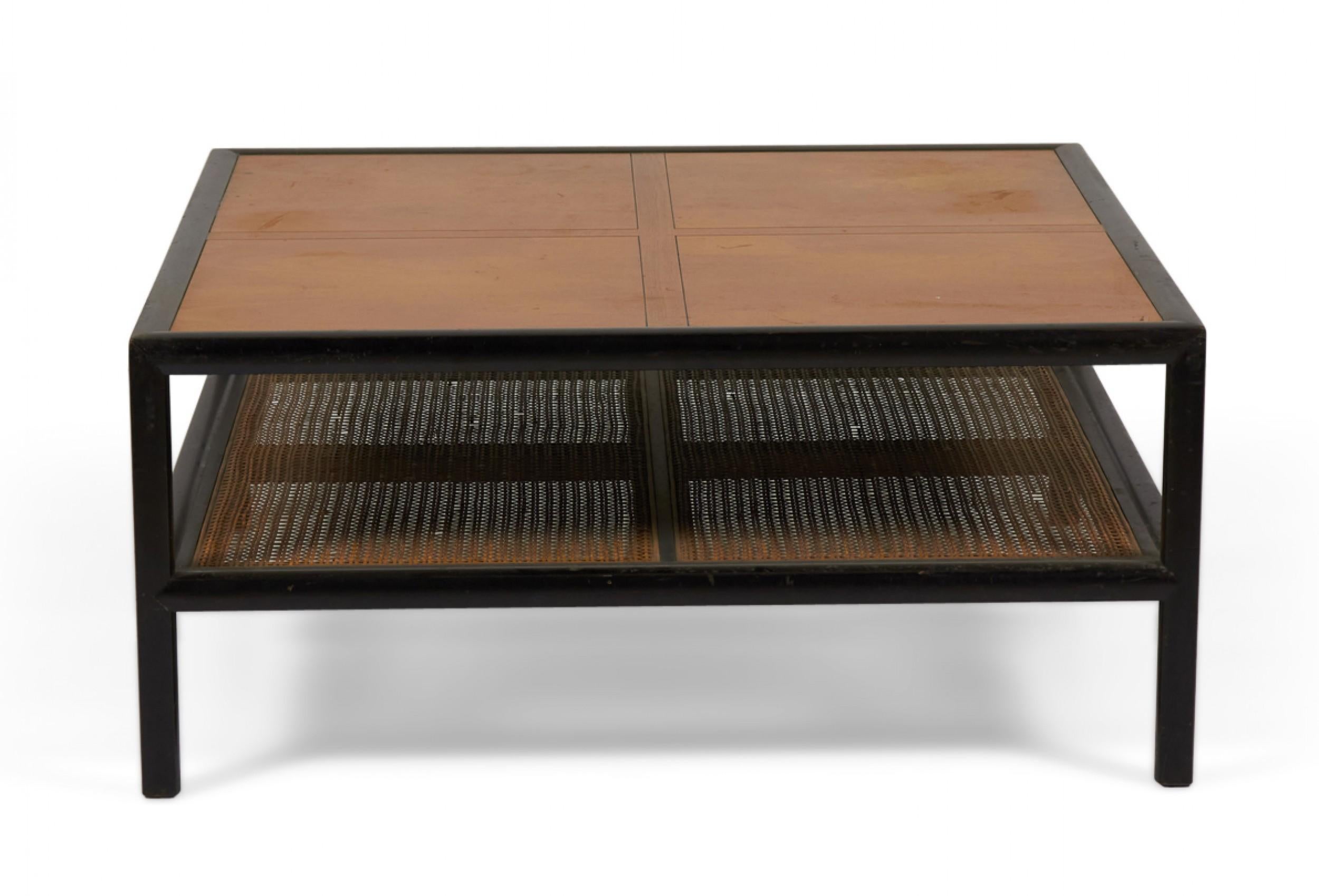 American mid-century 'New World' square coffee table with an ebonized wood frame, a walnut top, and a caned bottom stretcher shelf. (MICHAEL TAYLOR FOR BAKER FURNITURE COMPANY)