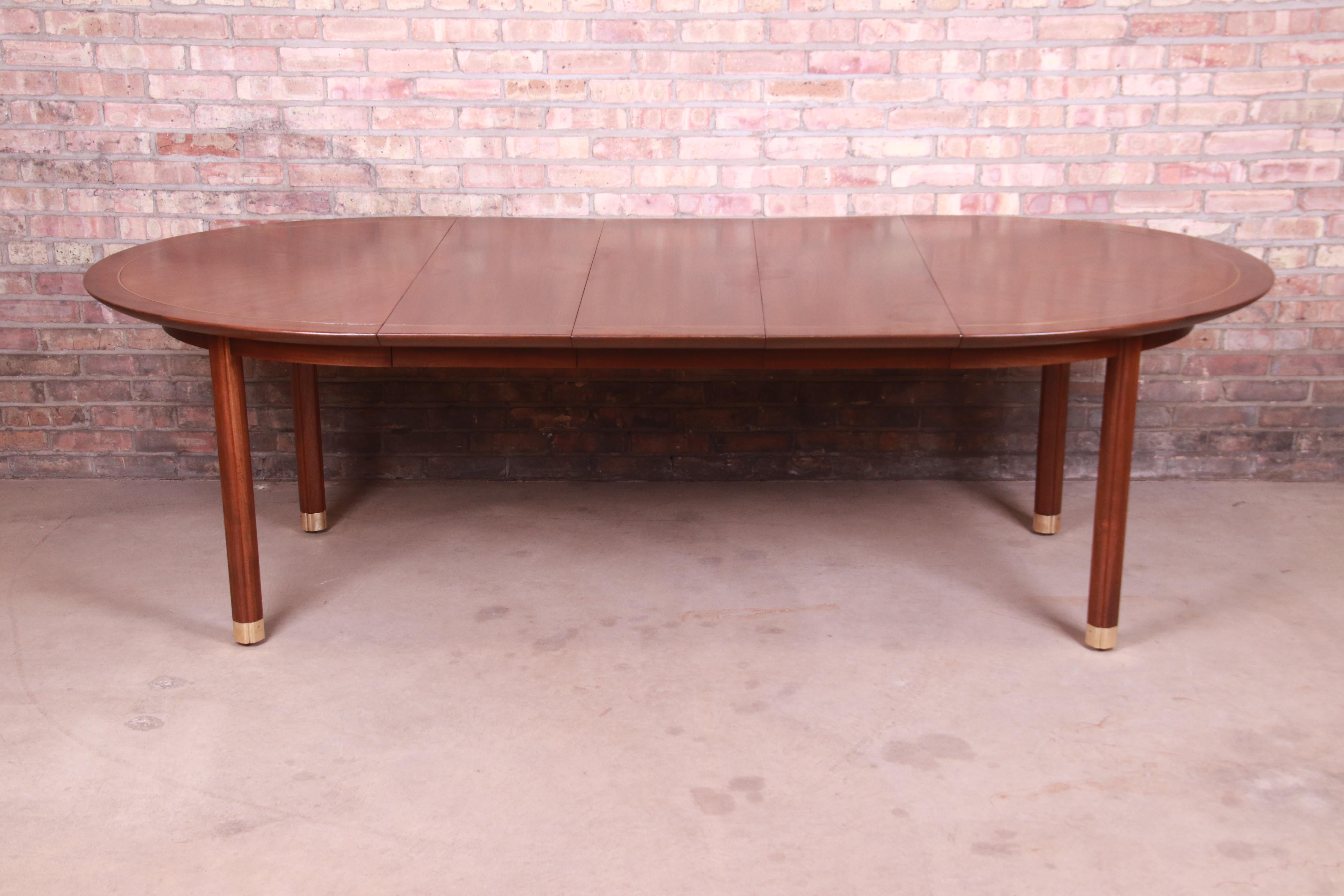 An exceptional Mid-Century Modern Hollywood Regency Chinoiserie extension dining table

By Michael Taylor for Baker Furniture 