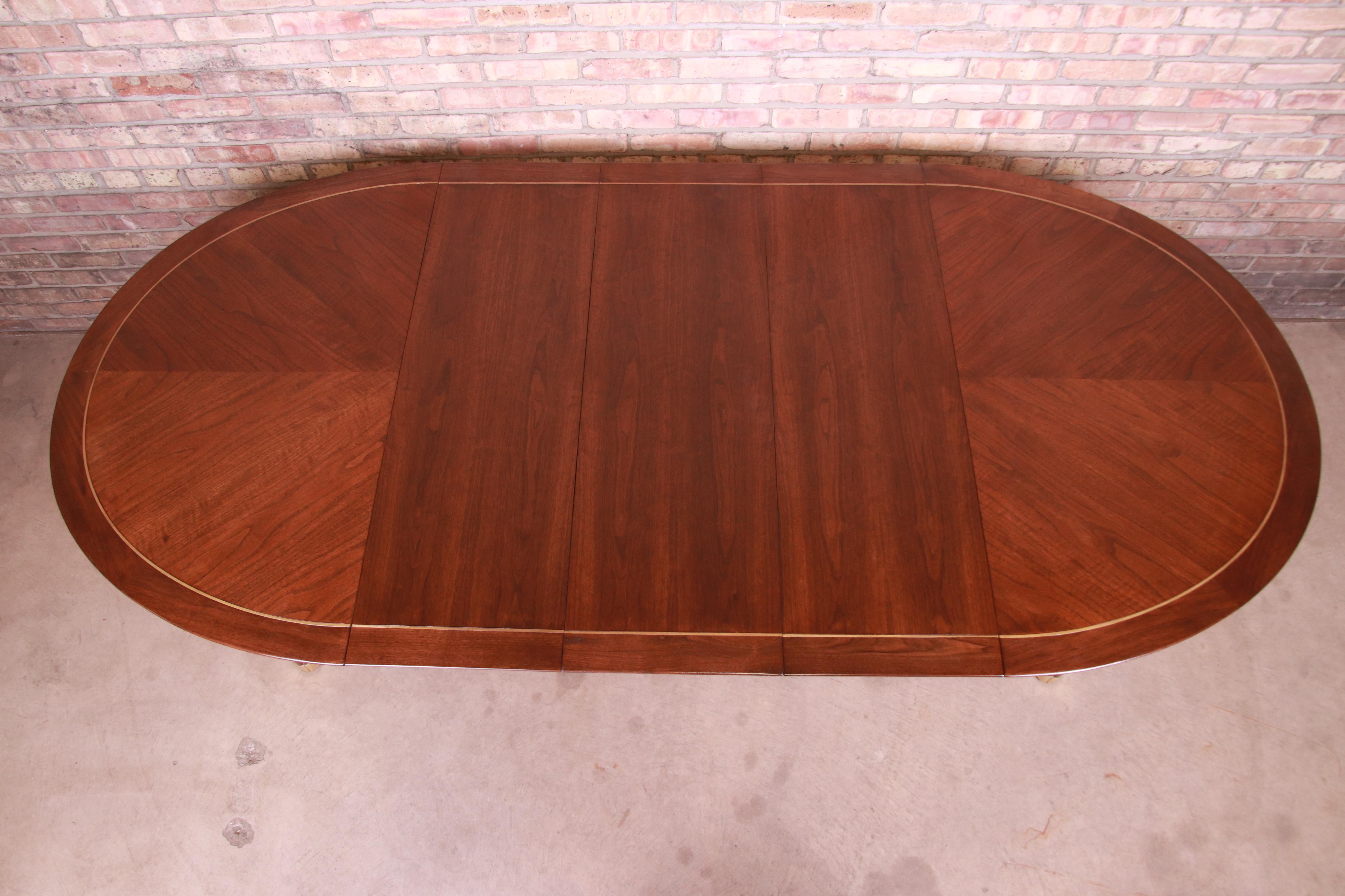 Mid-20th Century Michael Taylor for Baker Furniture Walnut and Brass Inlay Extension Dining Table