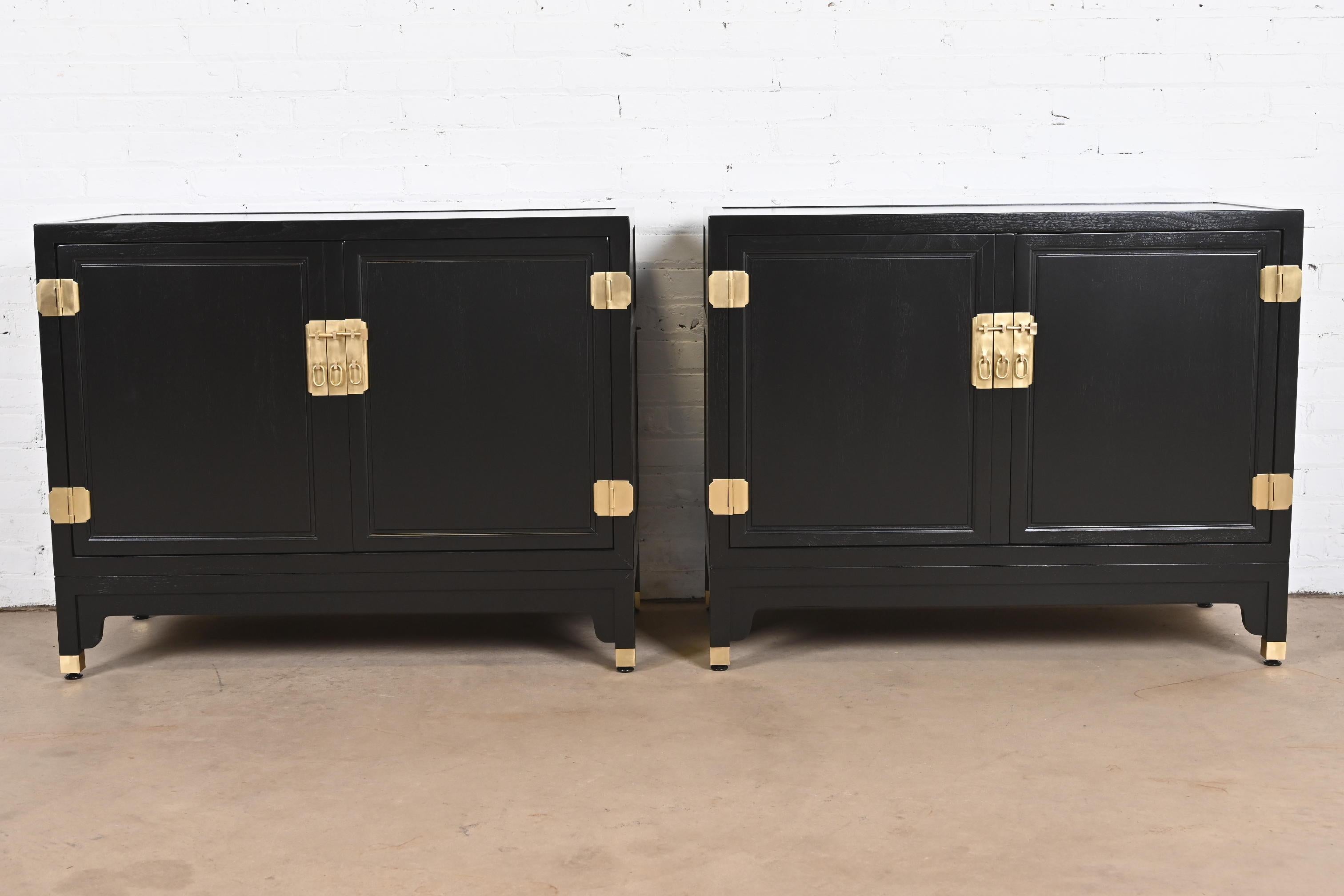 An exceptional pair of mid-century modern Hollywood Regency Chinoiserie compact credenzas, sideboard buffets, or bar cabinets

By Michael Taylor for Baker Furniture, 