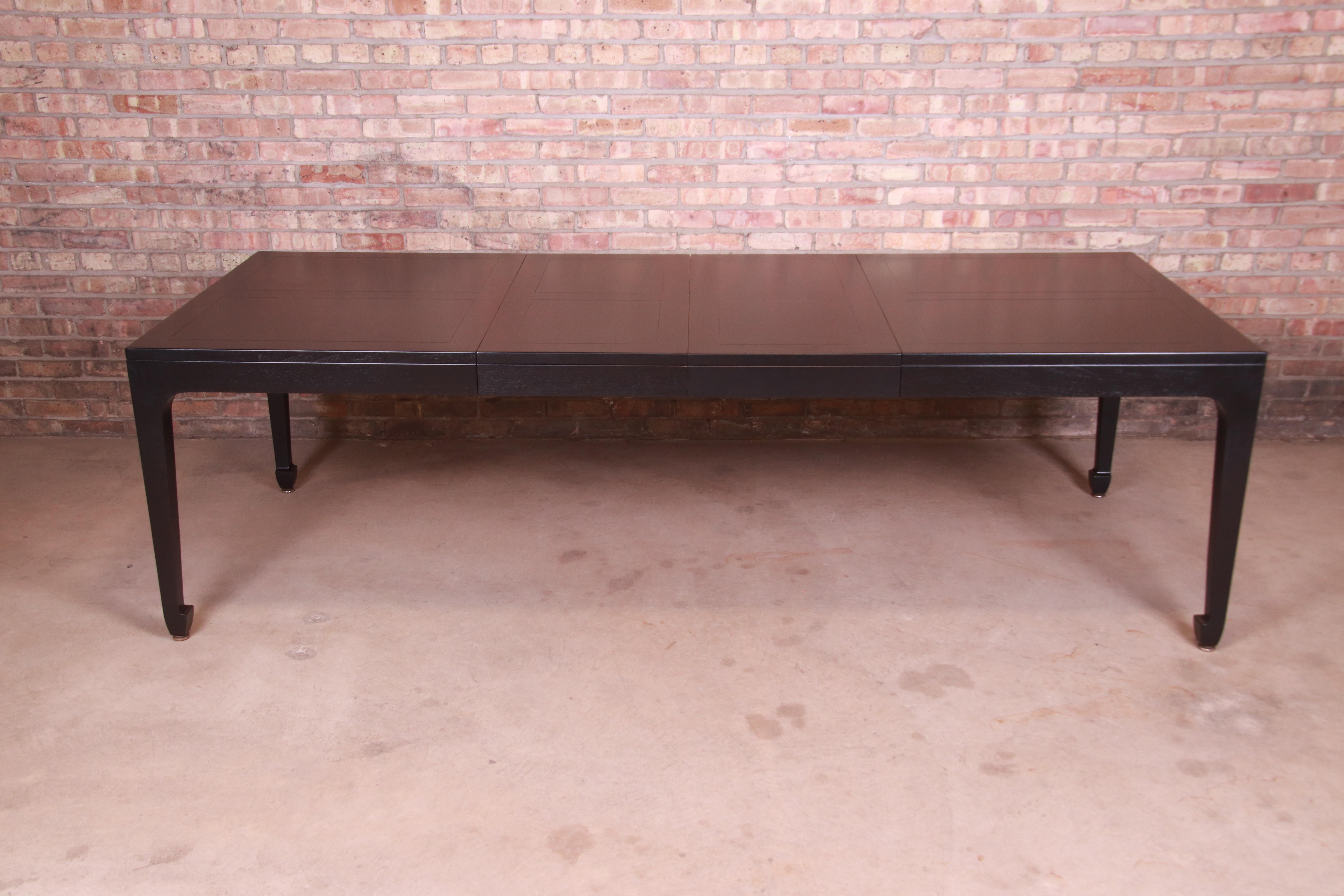 An exceptional Mid-Century Modern Hollywood Regency Chinoiserie extension dining table

By Michael Taylor for Baker Furniture, 