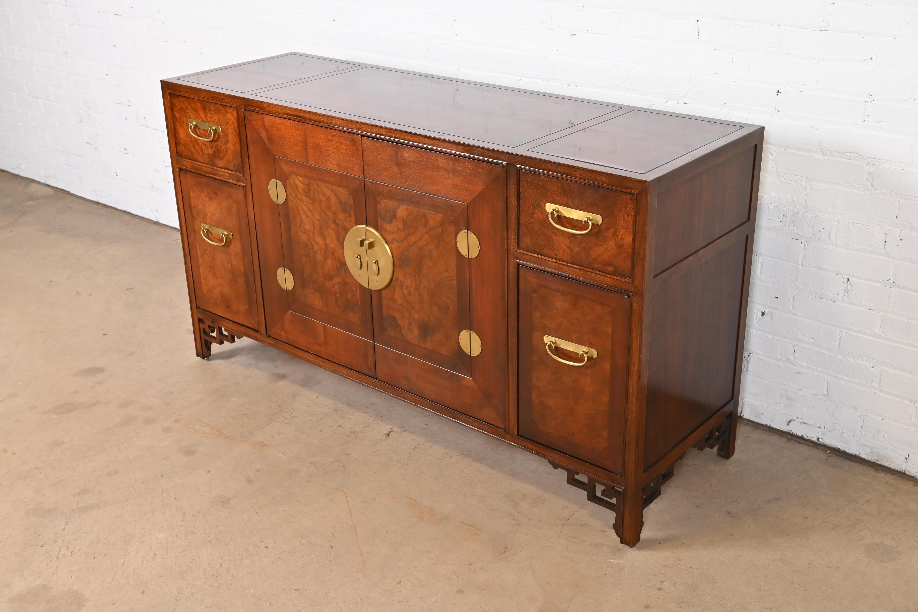 An exceptional Mid-Century Modern Hollywood Regency Chinoiserie sideboard, credenza, or bar cabinet

By Michael Taylor for Baker Furniture, 