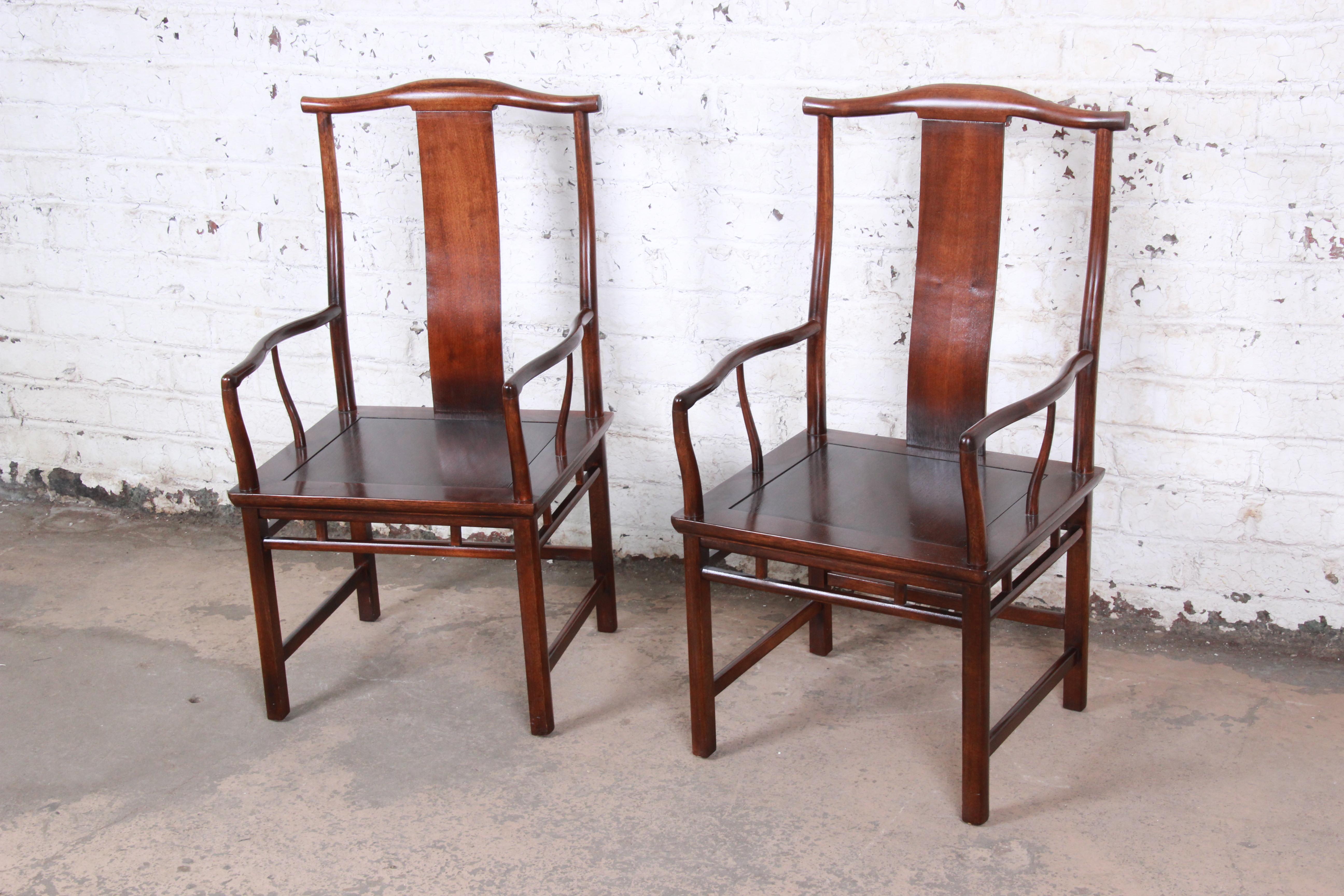 An exceptional pair of Mid-Century Modern Chinese official's yoke back chairs. Excellent for club chairs or dining captain chairs.

Designed by Michael Taylor for his Far East Collection for Baker Furniture

USA, circa 1950s

Solid walnut and