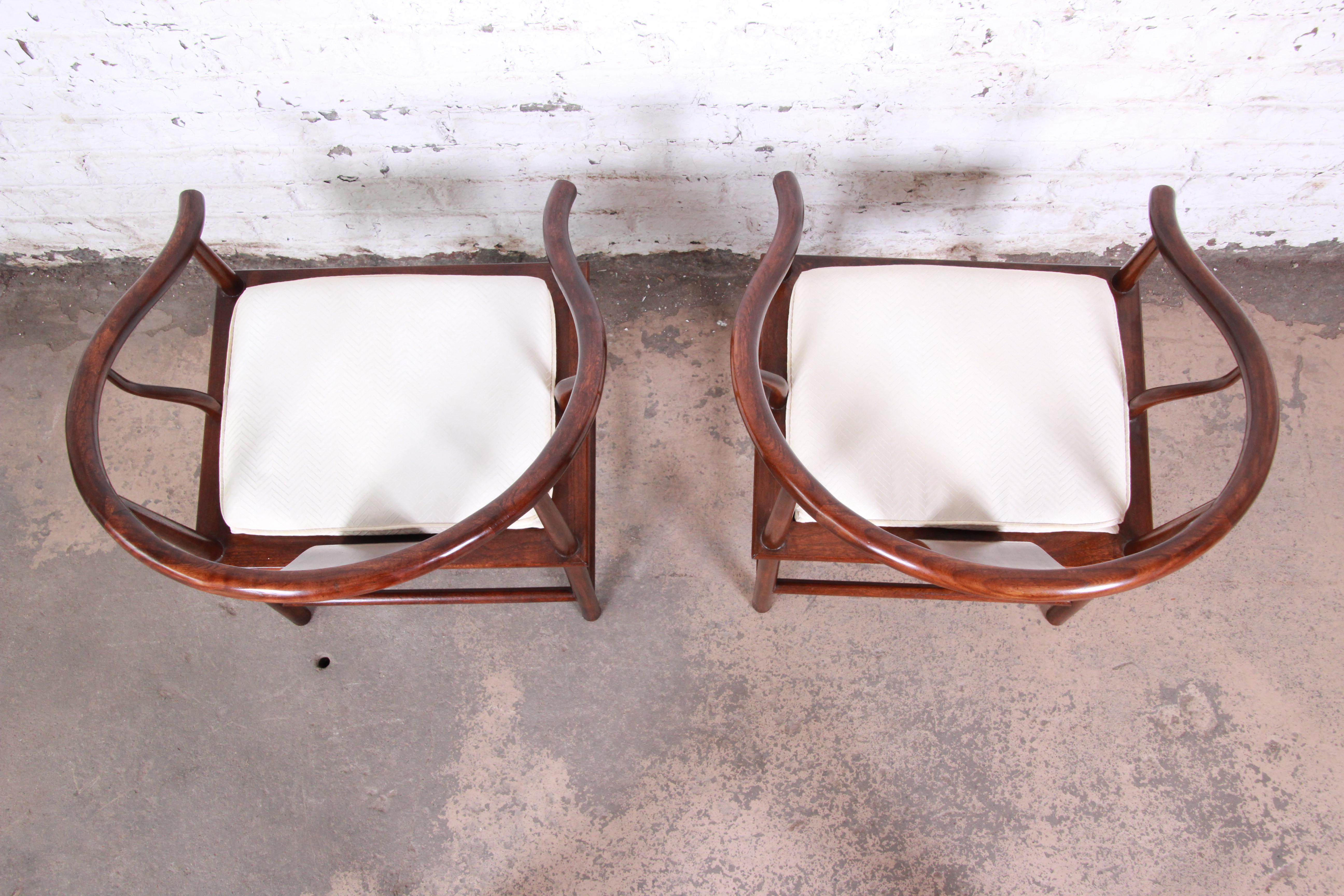 Mid-20th Century Michael Taylor for Baker Hollywood Regency Walnut Horseshoe Lounge Chairs, Pair