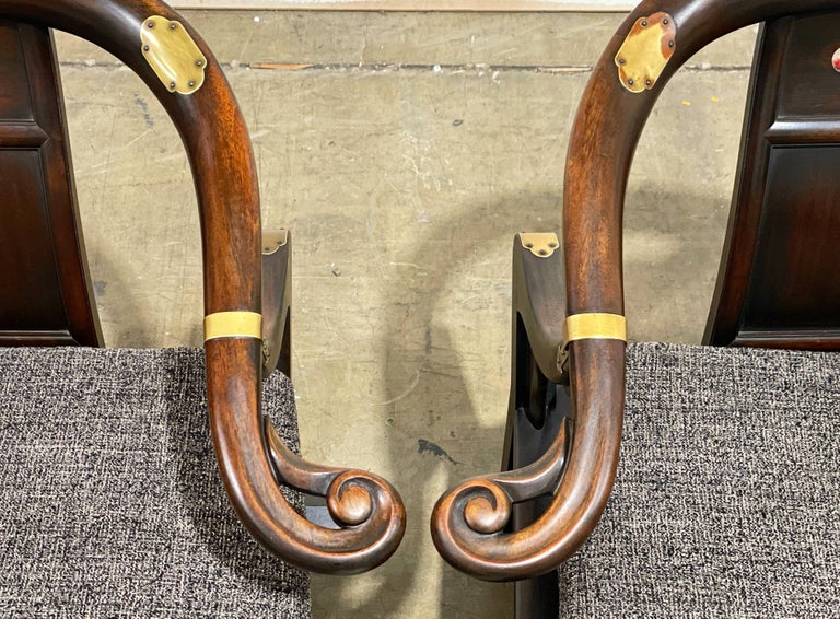 Michael Taylor for Baker - Far East Collection - Model 2510 - circa 1948
3 chairs available
Exquisite sculpted solid walnut and brass lounge chairs. Horseshoe or wishbone back with sled base. Stout and sturdy American craftsmanship.
These