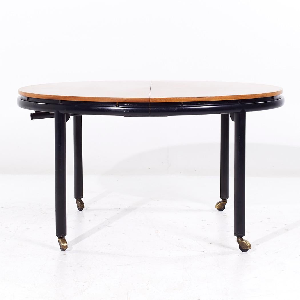 Michael Taylor for Baker Mid Century Table de salle à manger extensible avec 2 abattants

Cette table mesure : 54,25 de large x 46 de profond x 29 pouces de haut, avec un dégagement pour les chaises de 25,75 pouces, chaque feuille mesure 14 pouces