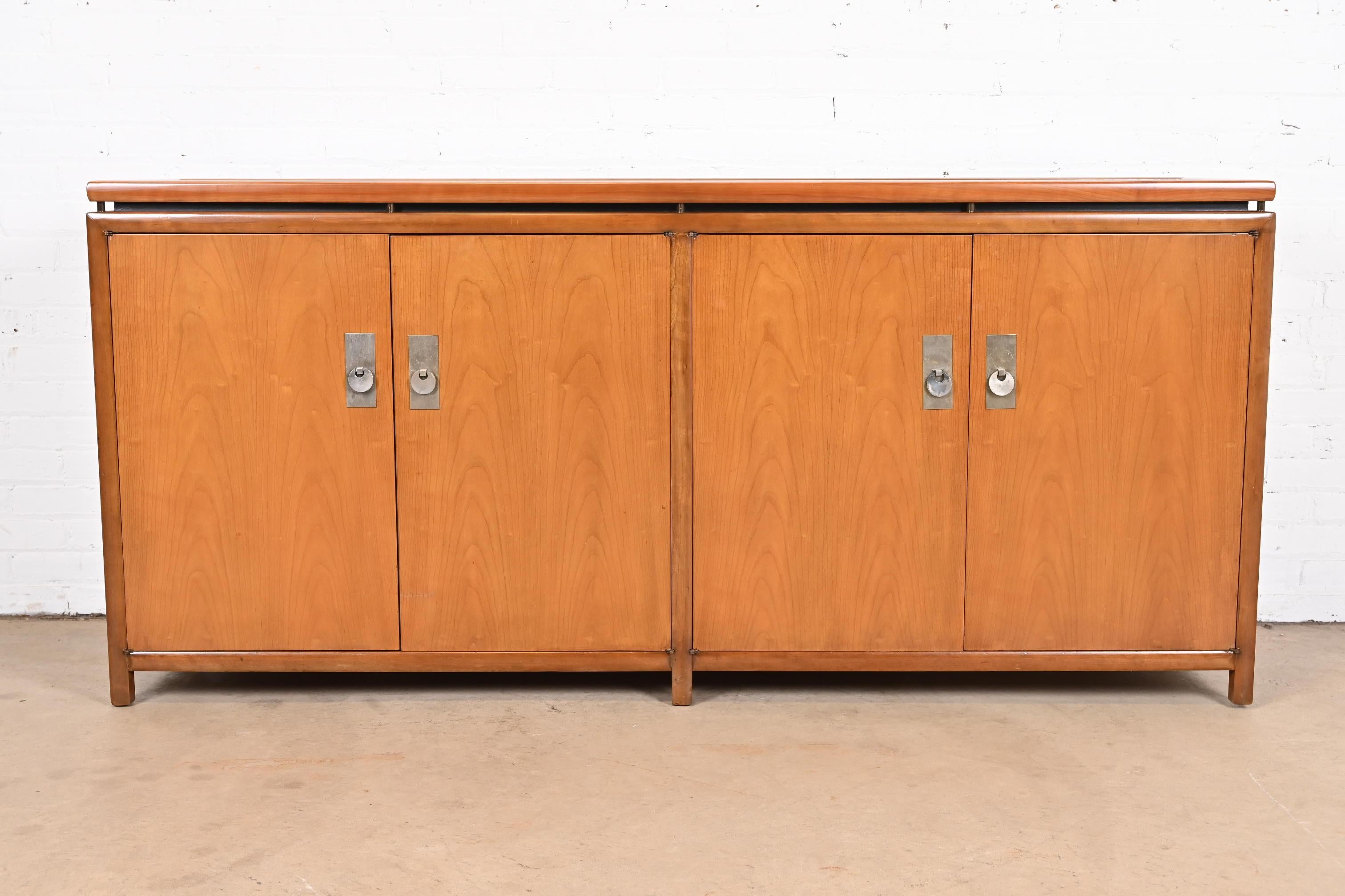 An exceptional Mid-Century Modern Hollywood Regency chinoiserie sideboard, credenza, or bar cabinet

By Michael Taylor for Baker Furniture, 