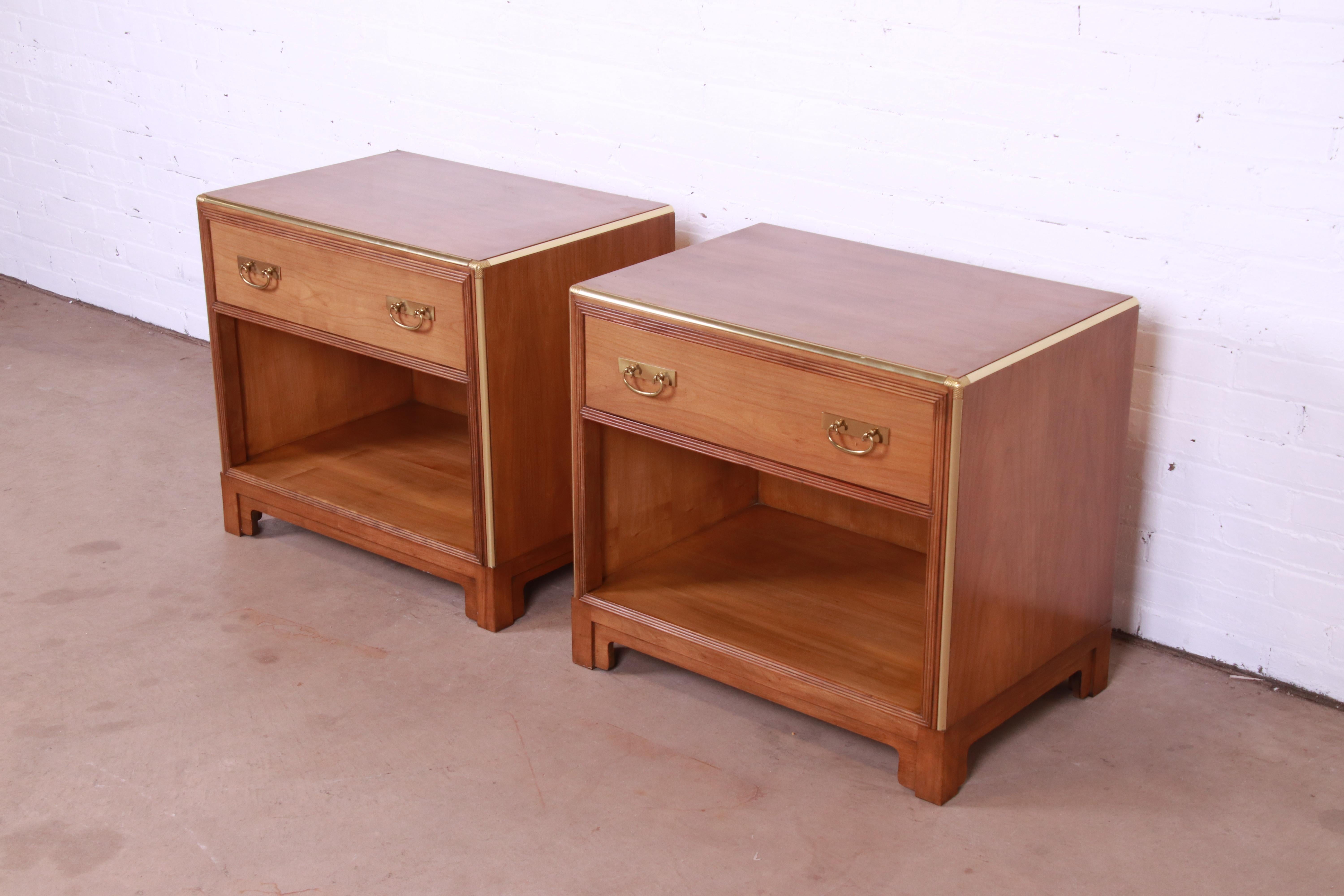A gorgeous pair of Mid-Century Modern Hollywood Regency Chinoiserie nightstands or side tables

By Michael Taylor for Baker Furniture, 