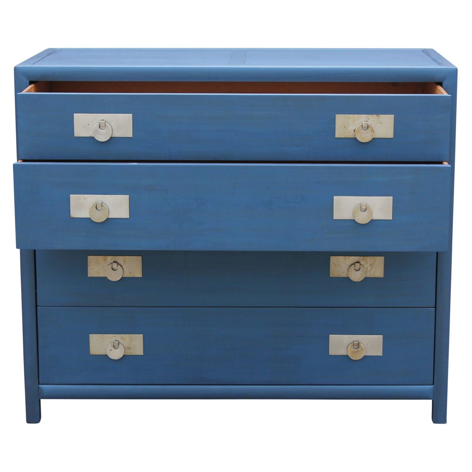 Striking chest of drawers by Michael Taylor for Baker's New World Collection. It is in a brilliant blue. 

 
