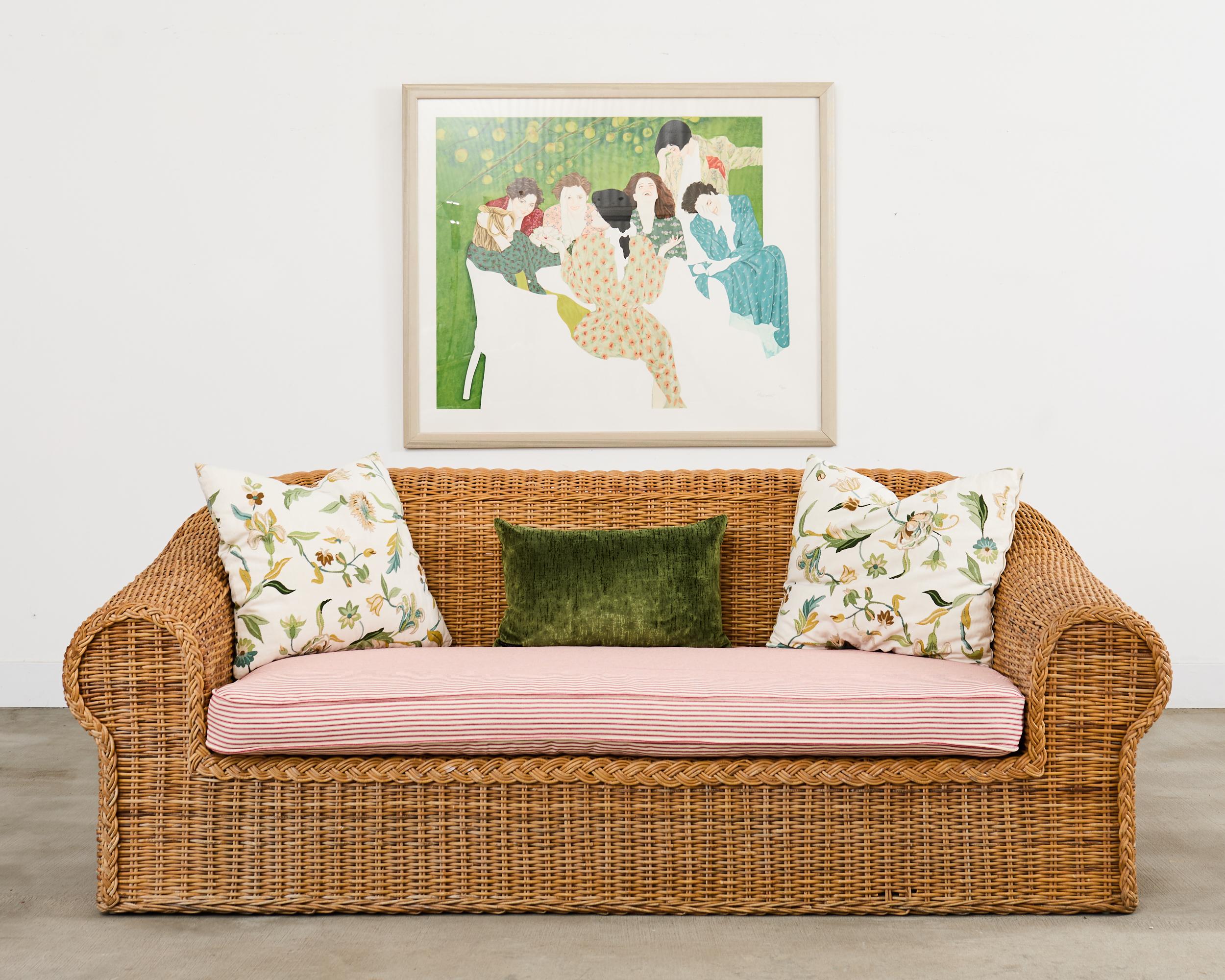 Grand organic modern sofa crafted from a pole rattan frame and covered with woven wicker. Inspired by the organic modern design of the 