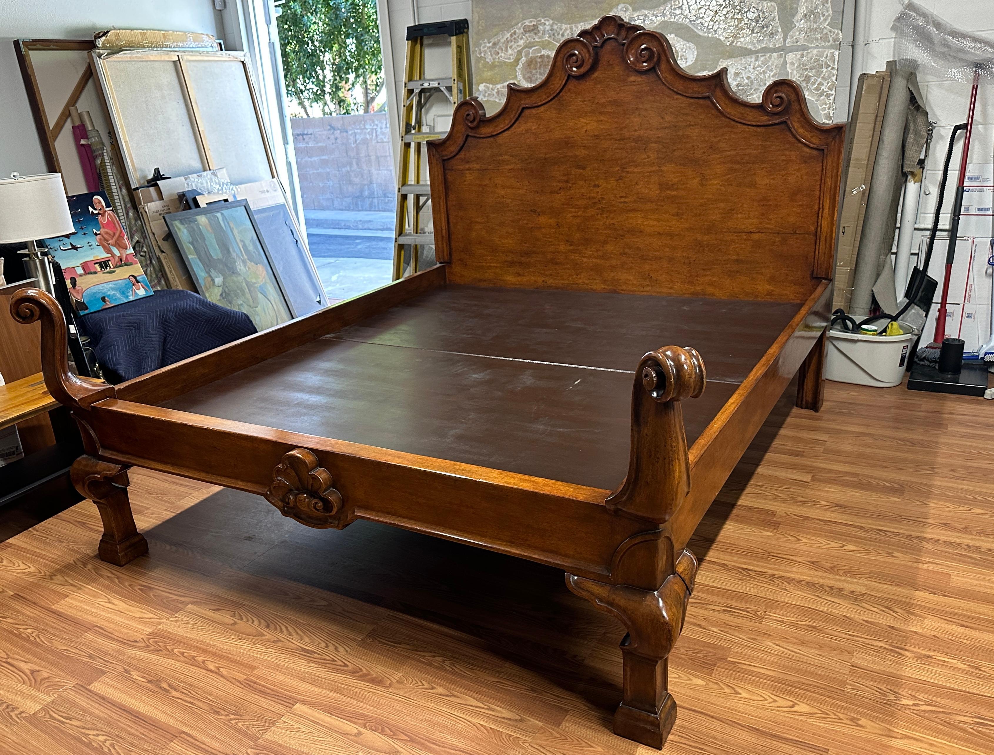 A beautiful bed frame designed by Michael Taylor. It his Italian bed and is in a California King size. The bed is beautifully carved and features his label on the back of the headboard. The interior mesurements are 74x86 inches. Out of a wonderful