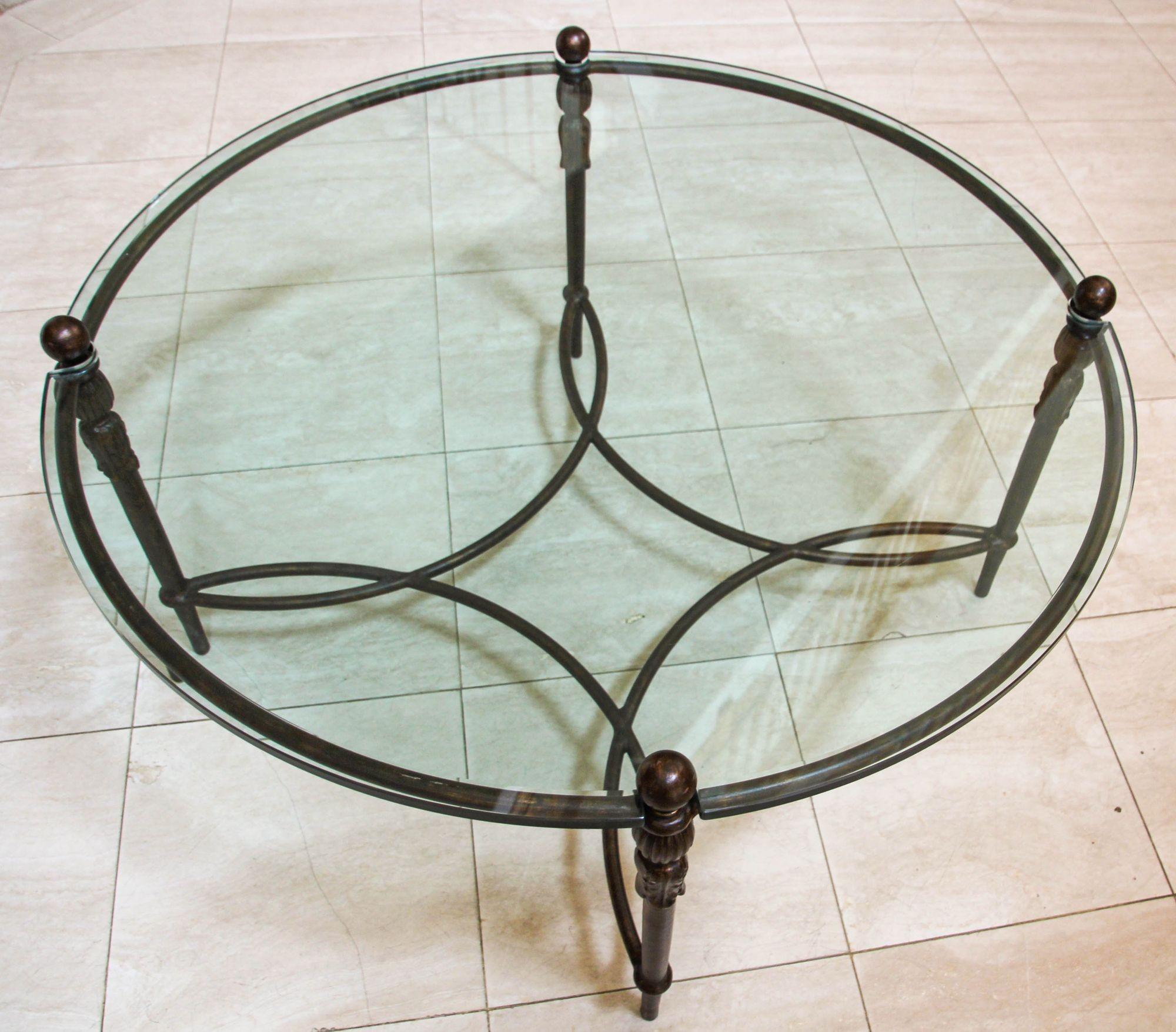 Michael Taylor Montecito Round Glass Coffee Table Outdoor Indoor Cocktail Table.
Constructed from solid aluminum for outdoor use with a premium dark oiled bronze finish.
The coffee table frame decorated in the neoclassical taste with acanthus