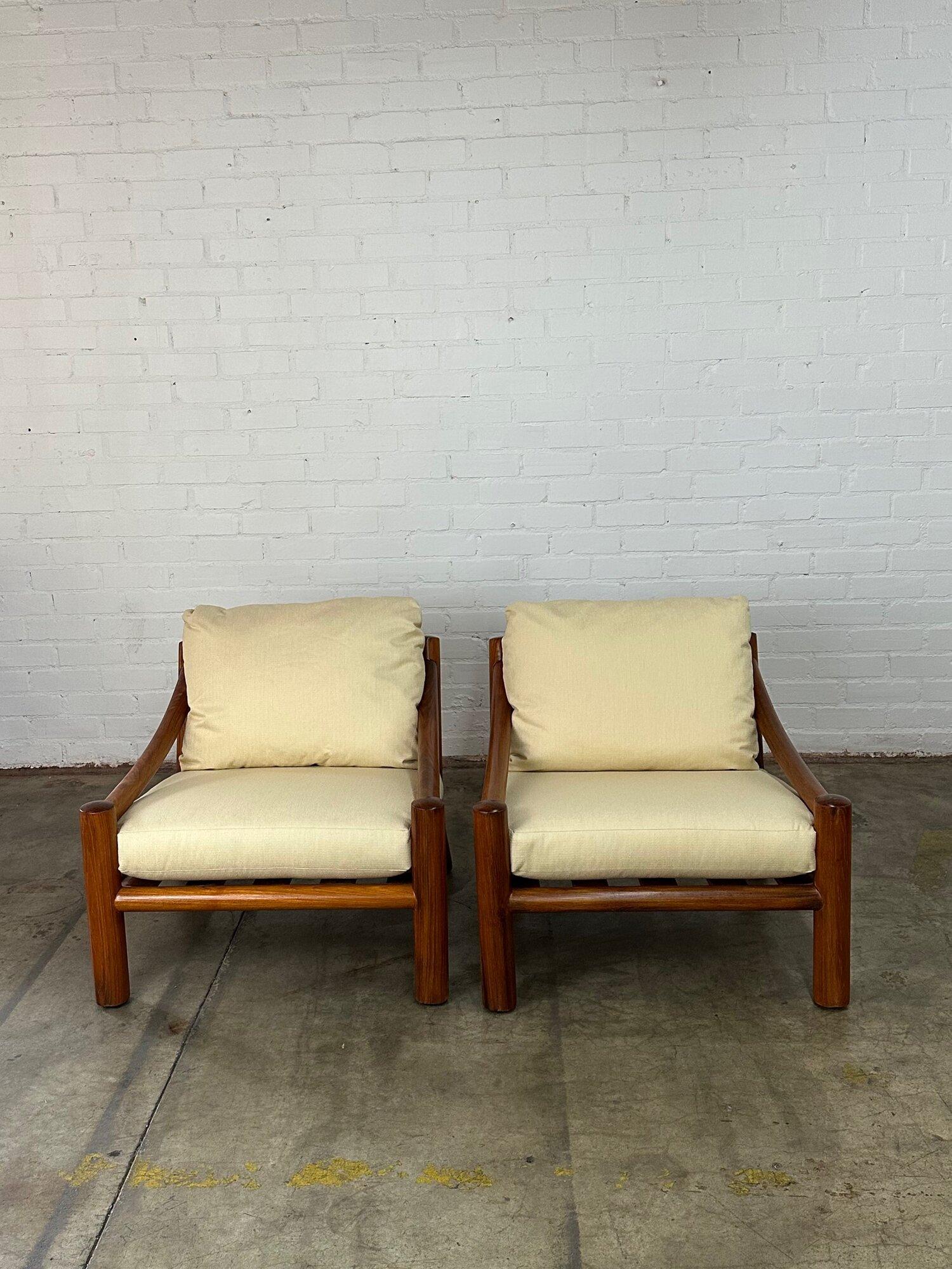 W36 D38 H30 SW29 SD21 SH18 AH20.

Fully restored solid teak outdoor lounge chairs. The pair is structurally sound and has newly refinished frames with fresh outdoor fabric. The set is part of Michael Taylor Outdoor Douglas Teak Collection. Price
