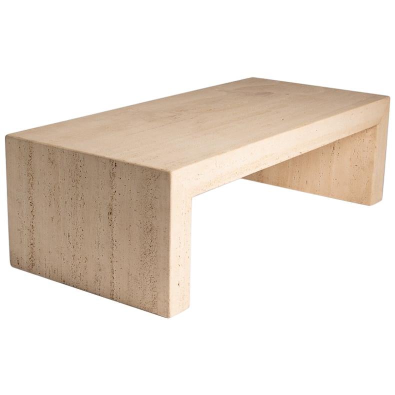 Pair of rectangular travertine benches by American designer Michael Taylor.