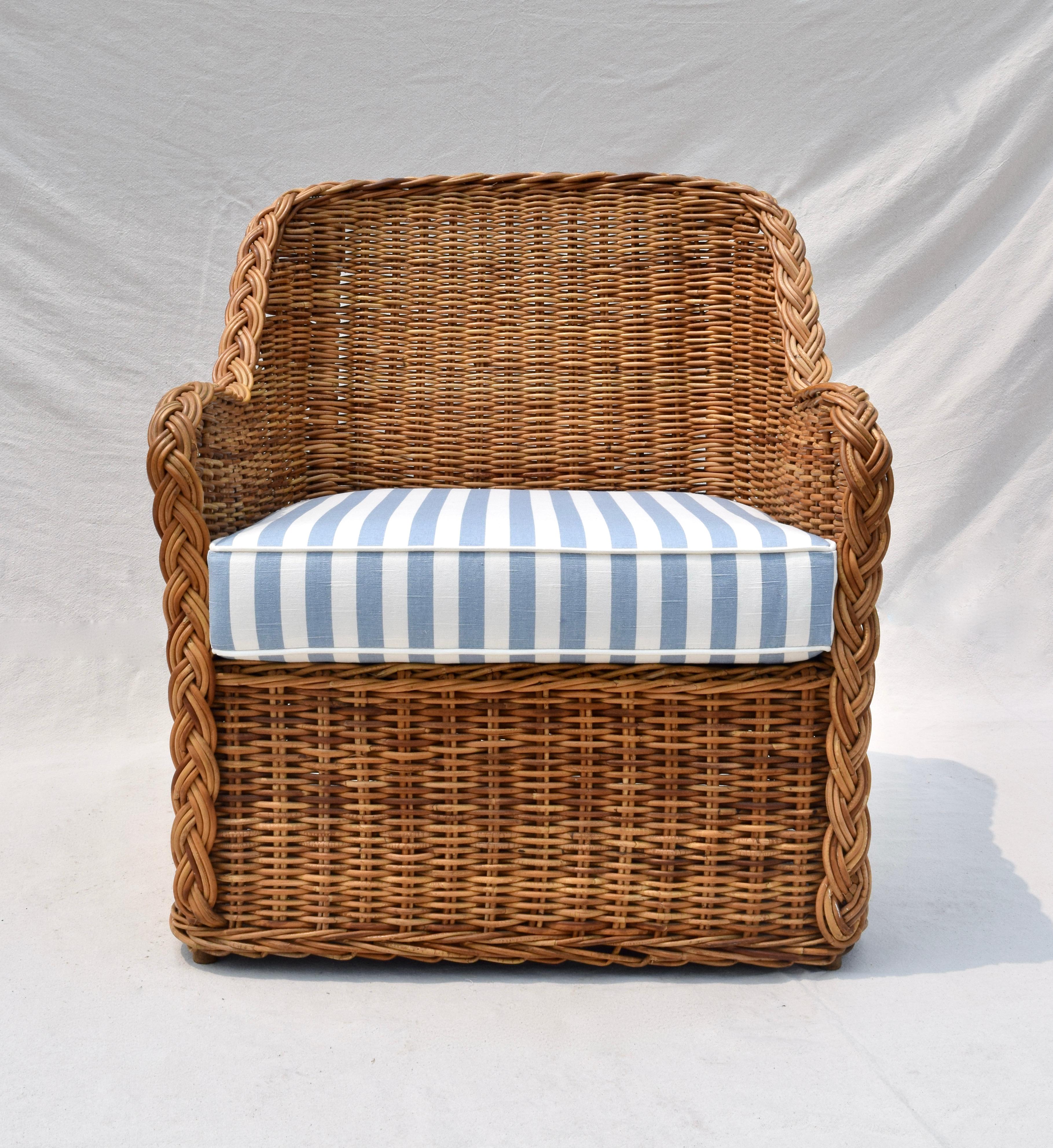 Michael Taylor braided wicker rattan armchair with new seat & goose down back cushions upholstered in new stock vintage Ralph Lauren sky blue and white cotton linen. Seat: 17