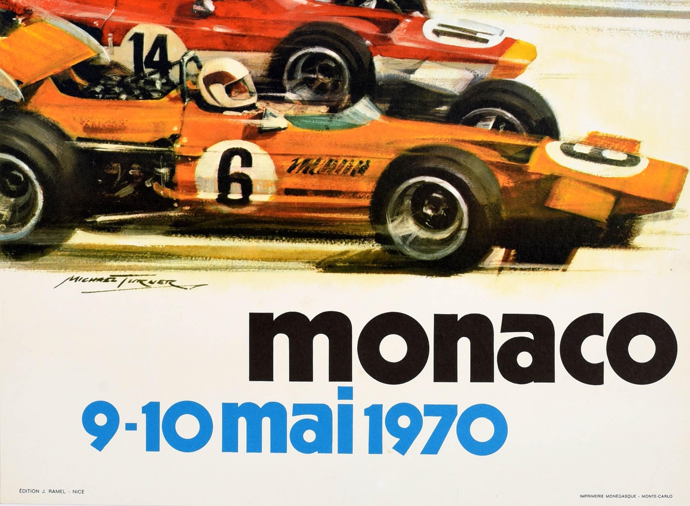 Original vintage sport poster for the Monaco Grand Prix 9-10 May 1970 featuring a dynamic illustration of two formula one cars racing on a road alongside a sailing boat on the water with a lighthouse and buildings on the hillside in the background.