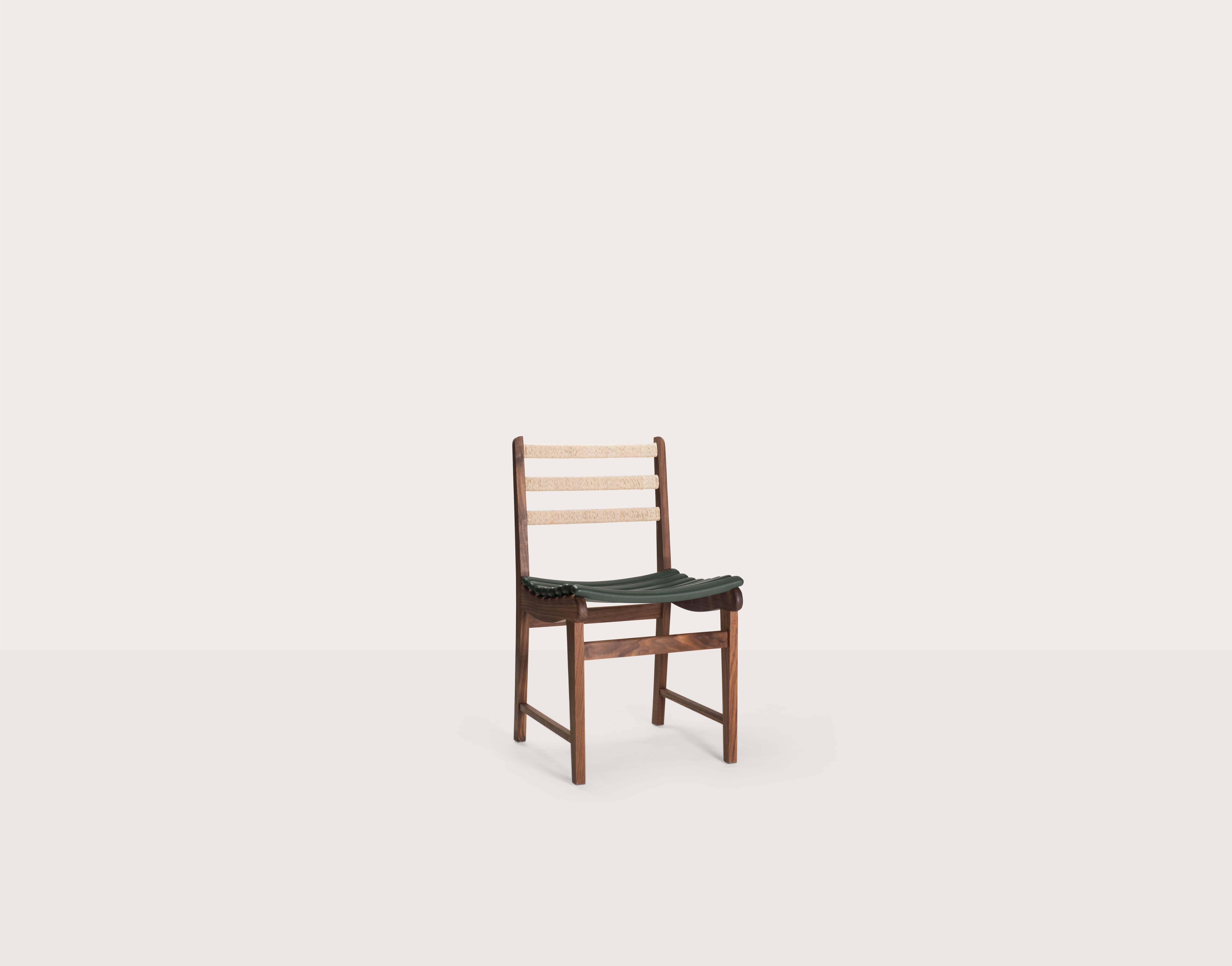 The San Miguelito dining chair was designed in circa 1945 by Michael van Beuren, an American who attended Germany's prestigious Bauhaus school and later immigrated to Mexico to become one of the most famous furniture designers of 20th Century. He