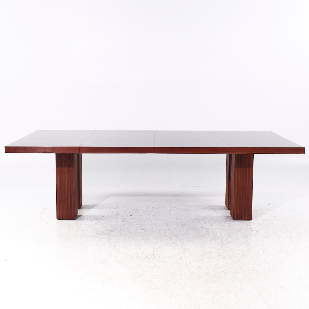 Michael Vanderbyl for Baker Furniture Archetype Mahogany Dining Table

This table measures: 50 wide x 50 deep x 29.25 inches high, with a chair clearance of 27 inches, each leaf measures 25 inches wide, making a maximum table width of 100 inches