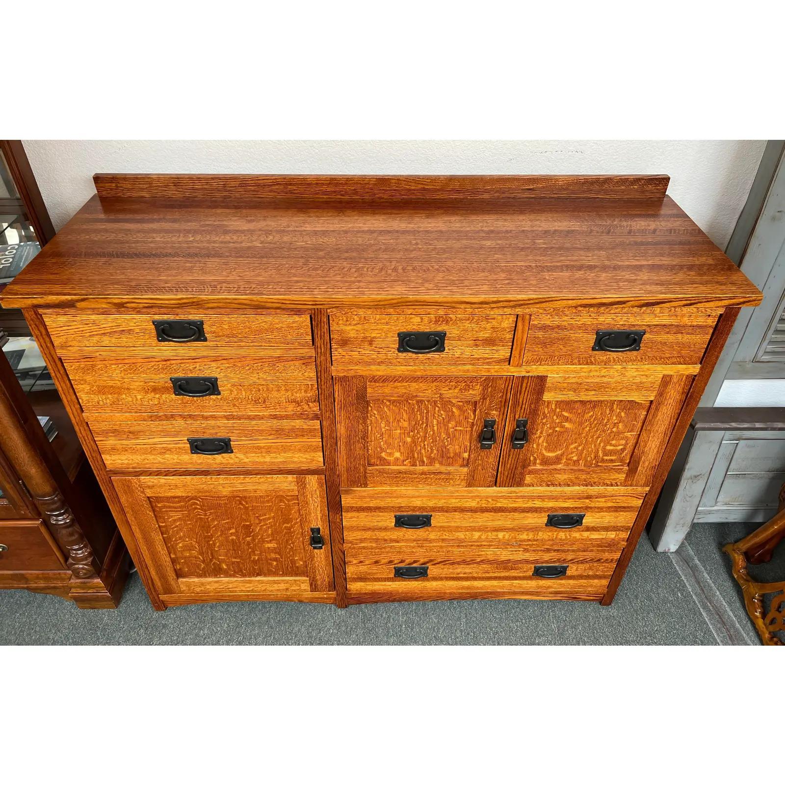 Designed by Restoration Hardware in-house designer Michael Vermillion, this mission style cabinet evokes a classical feel with modern construction. Made primarily of a beautiful warmly finished golden oak exterior, it features a very high-quality