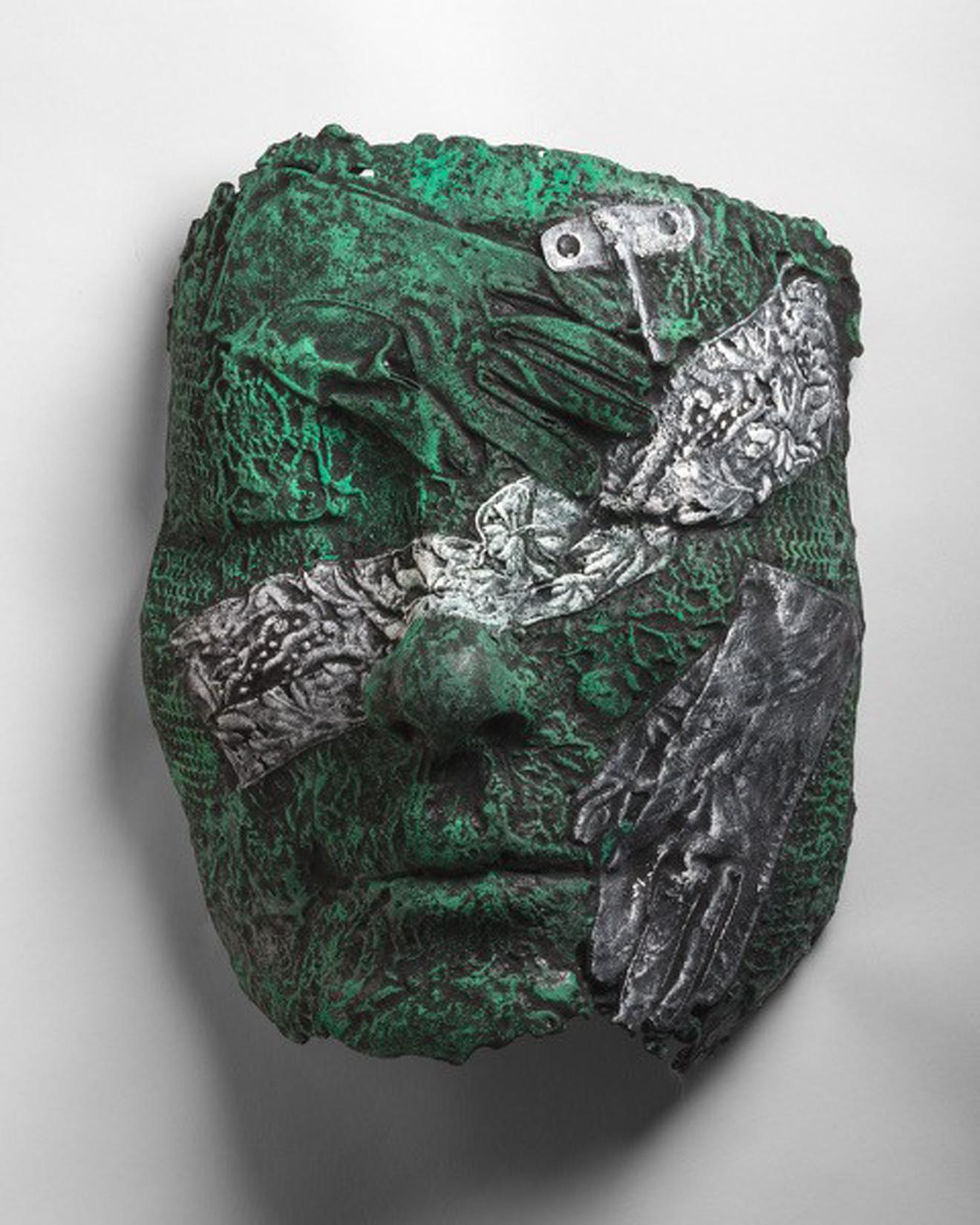 Jonah with Key by Michael Warrick
20x15x4" aluminum, wall mounted sculpture
Fragment of a portrait with impressions of their interests highlighted across the face.

Shipping price includes the custom packing necessary for safe transport of fine