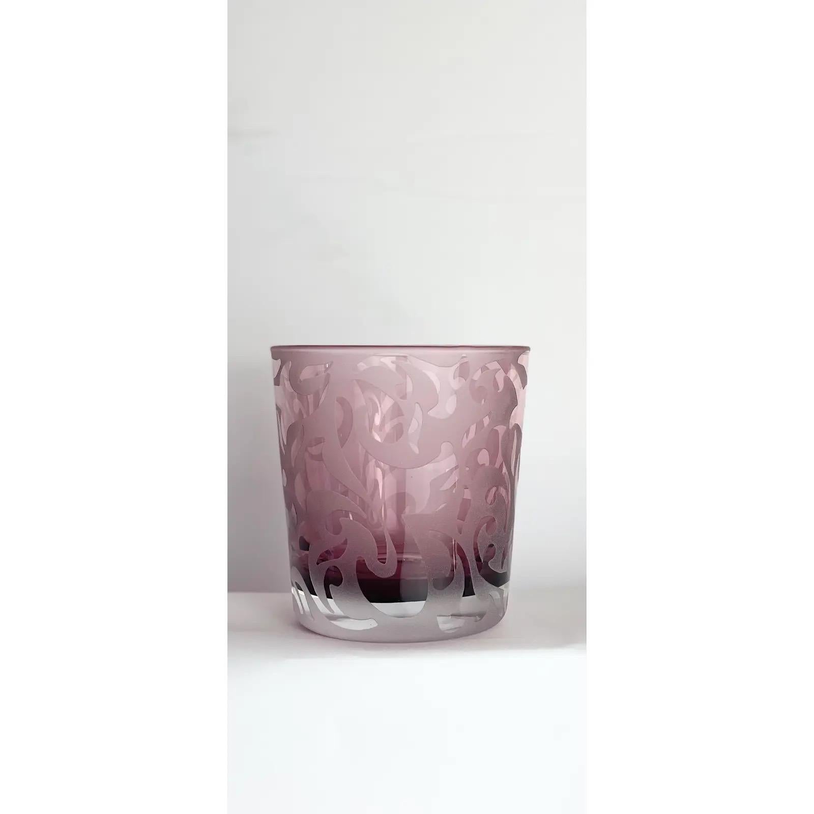 We are very pleased to offer a beautiful and sophisticated set of six tumbler glasses by Michael Weems, circa the 2000s. Known for creating beautiful collections of original and unique artwork, these hand etched set is art for the table. Each glass