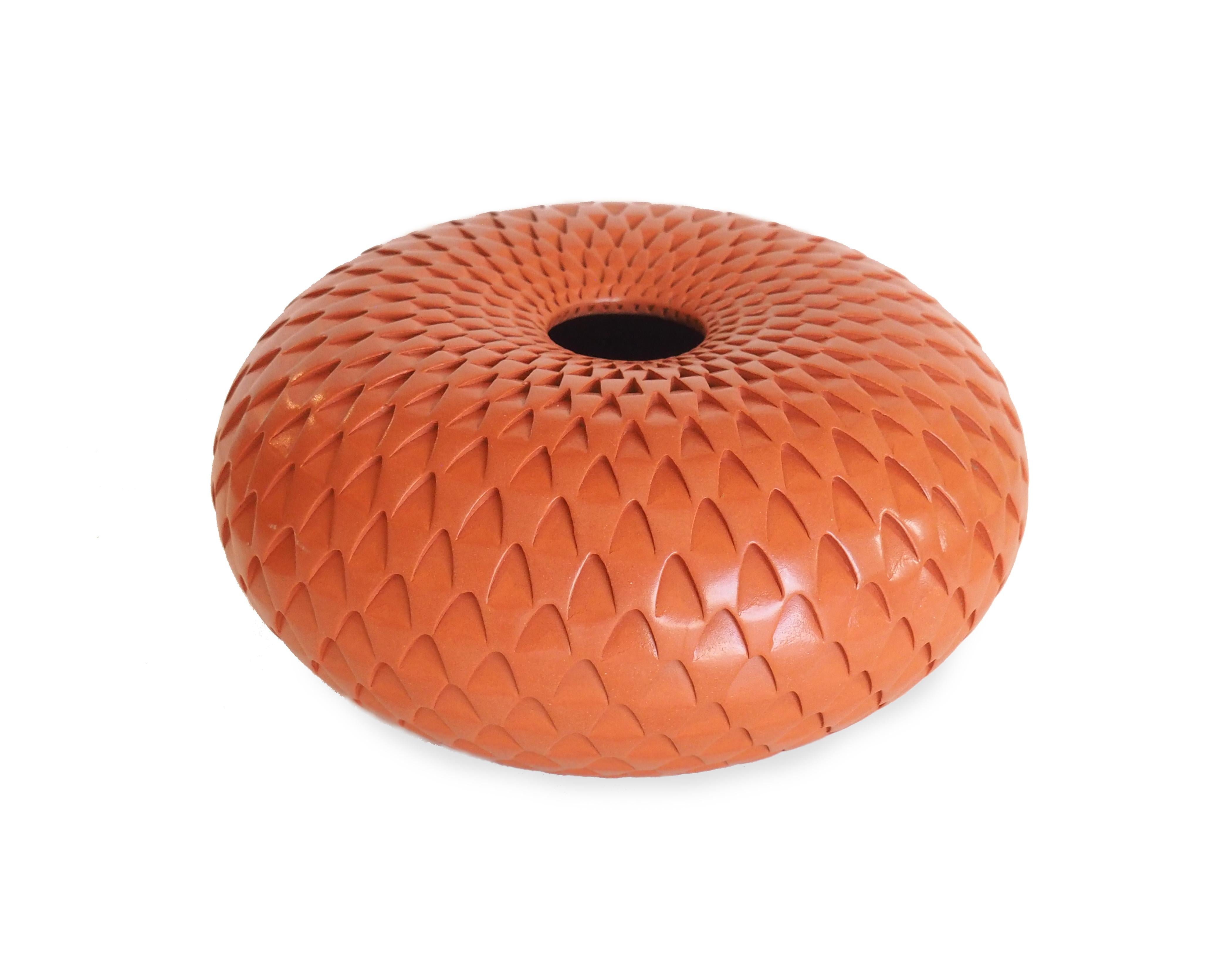 Inspired by ancient Anasazi and Mimbres potsherds, Michael Wisner began making southwestern pottery nearly 20 years ago. He digs local clays from the ground near his studio in Woody Creek, Colorado. The clay is filtered to remove rocks and debris