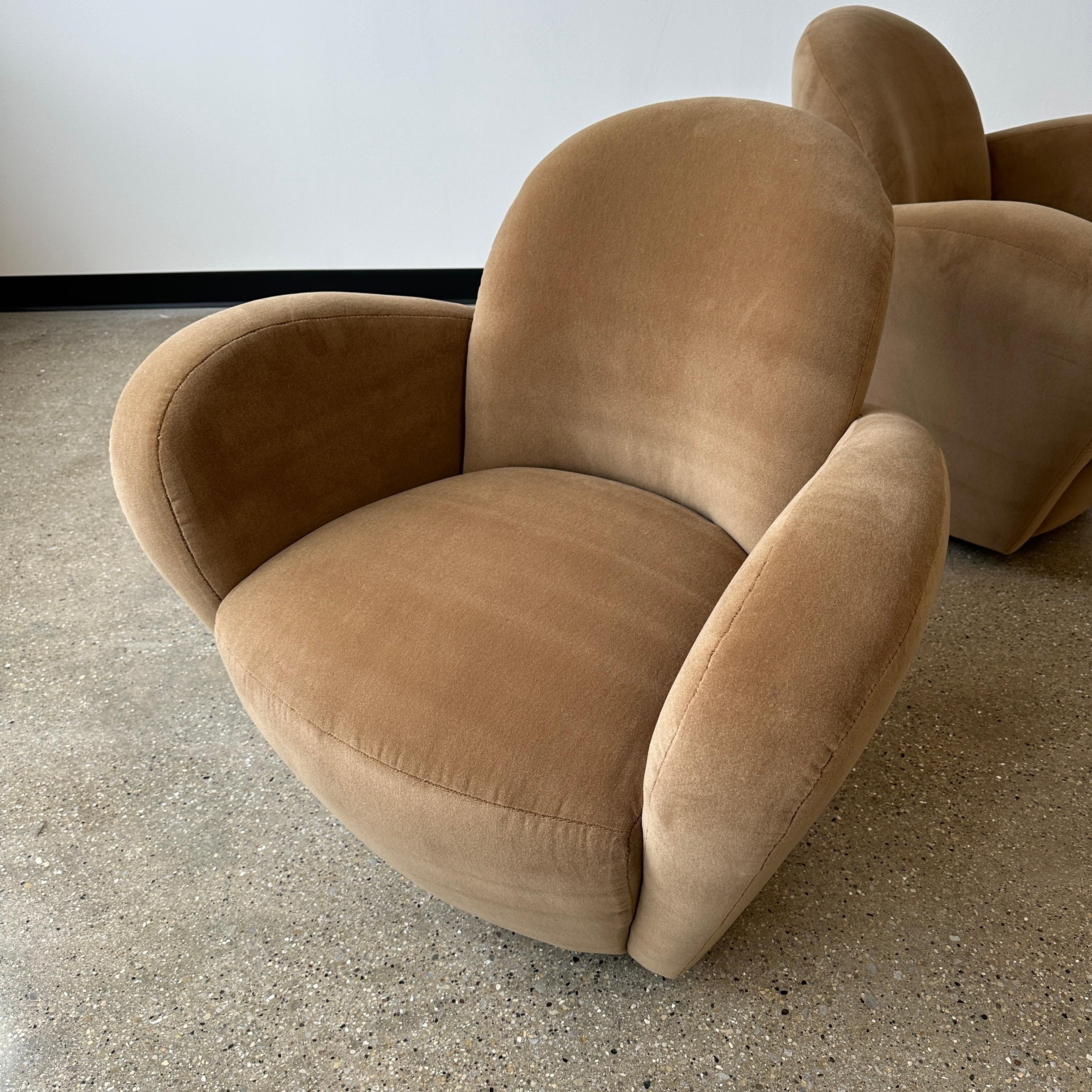 c. 1980s for Preview, fully restored in a wool velvet. Both chairs feature a return-to-zero swivel mechanism and are in great condition