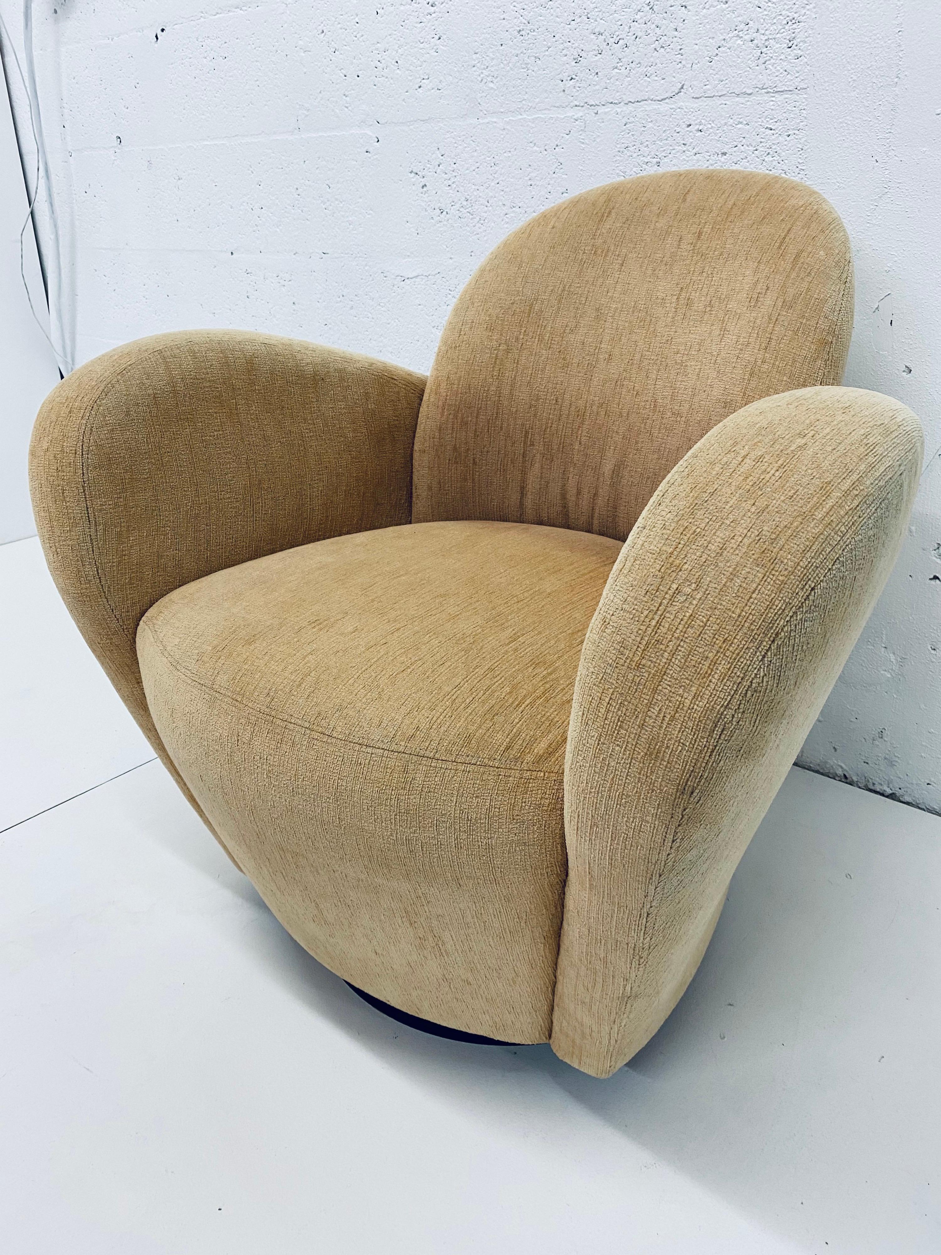 This iconic Michael Wolk designed Miami lounge chair sits on a swivel base and is ready for new upholstery.

While driving through coconut grove, Florida in the early 1980s, Wolk passed an interesting hedge. This hedge quickly became the