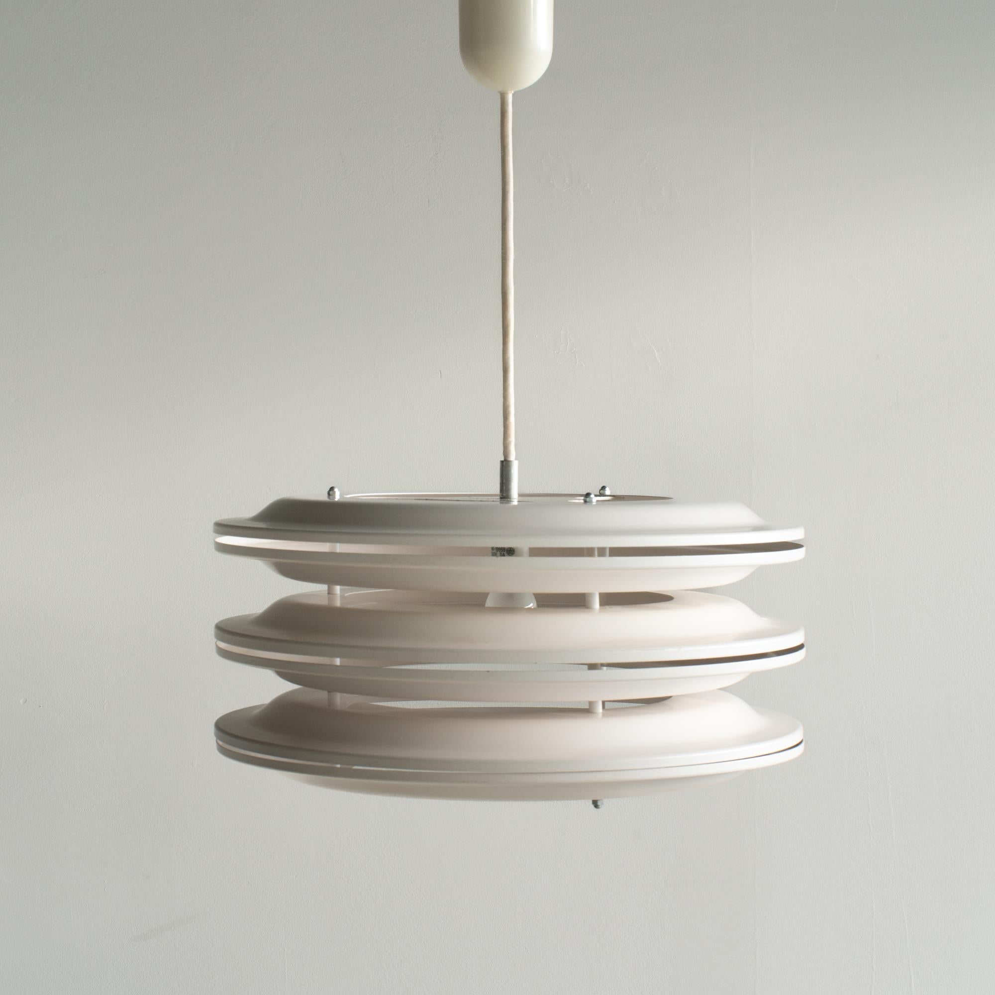 Pendant lamp designed by Michael Young in the mid 90s. It is suitable for Y2K style pop interior. Also, Mid-century style and Space Age style. 
It was produced by Japanese furniture company E&Y. In those days, Michael Young designed some works